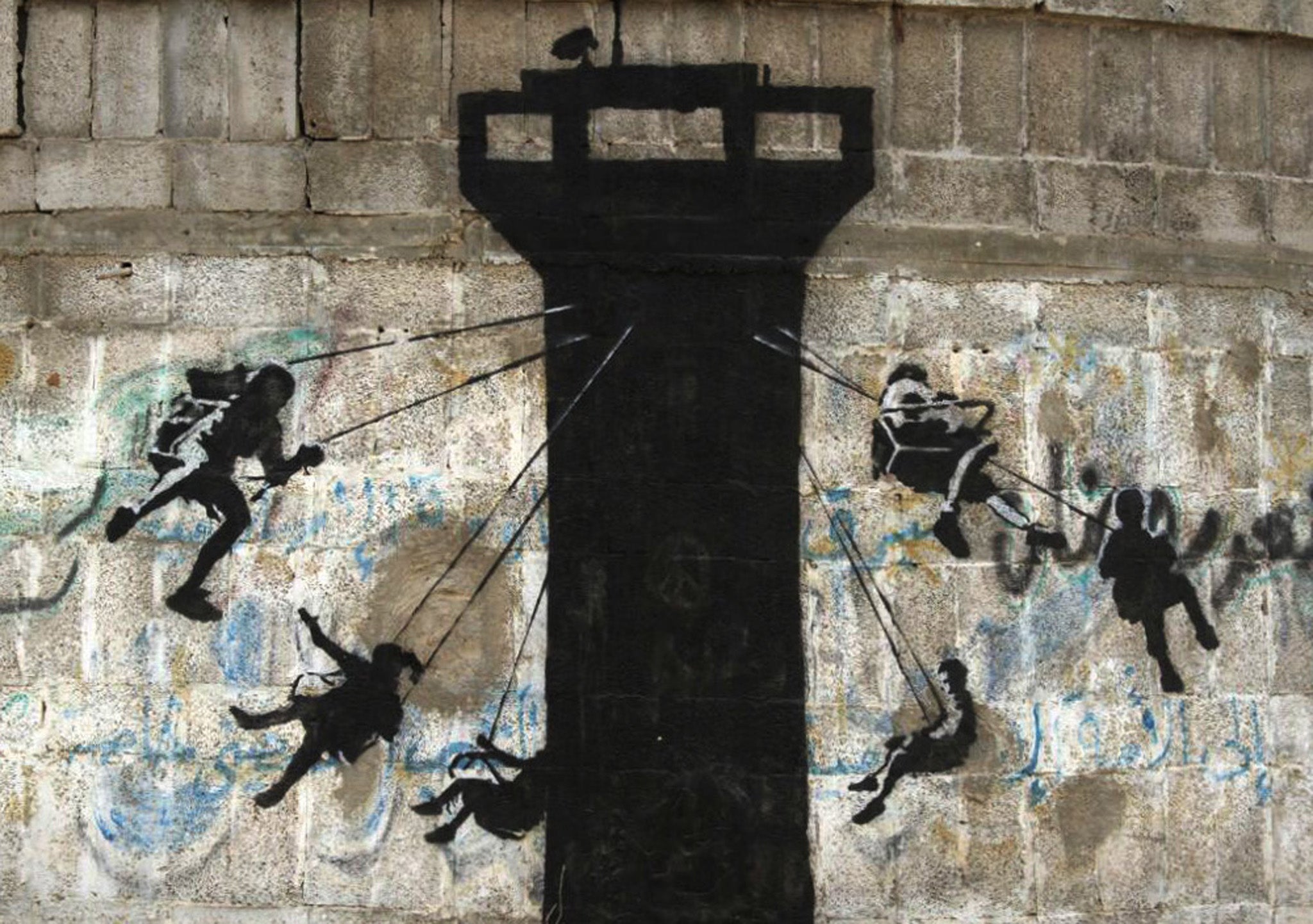 A Banksy sprayed on concrete called 'Bomb damage, Gaza City'