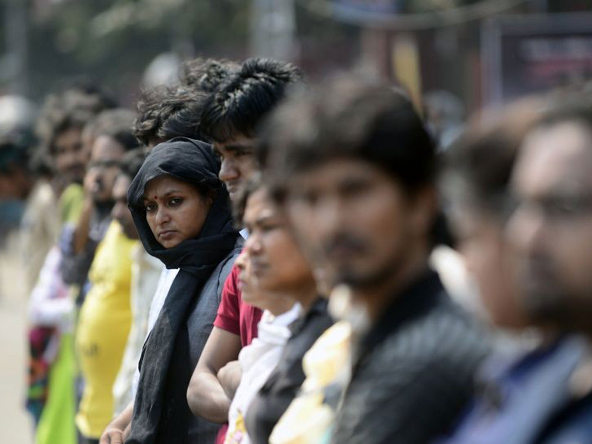 Bangladeshi social activists form a human chain during a protest against the killing of US blogger of Bangladeshi origin, Avijit Roy