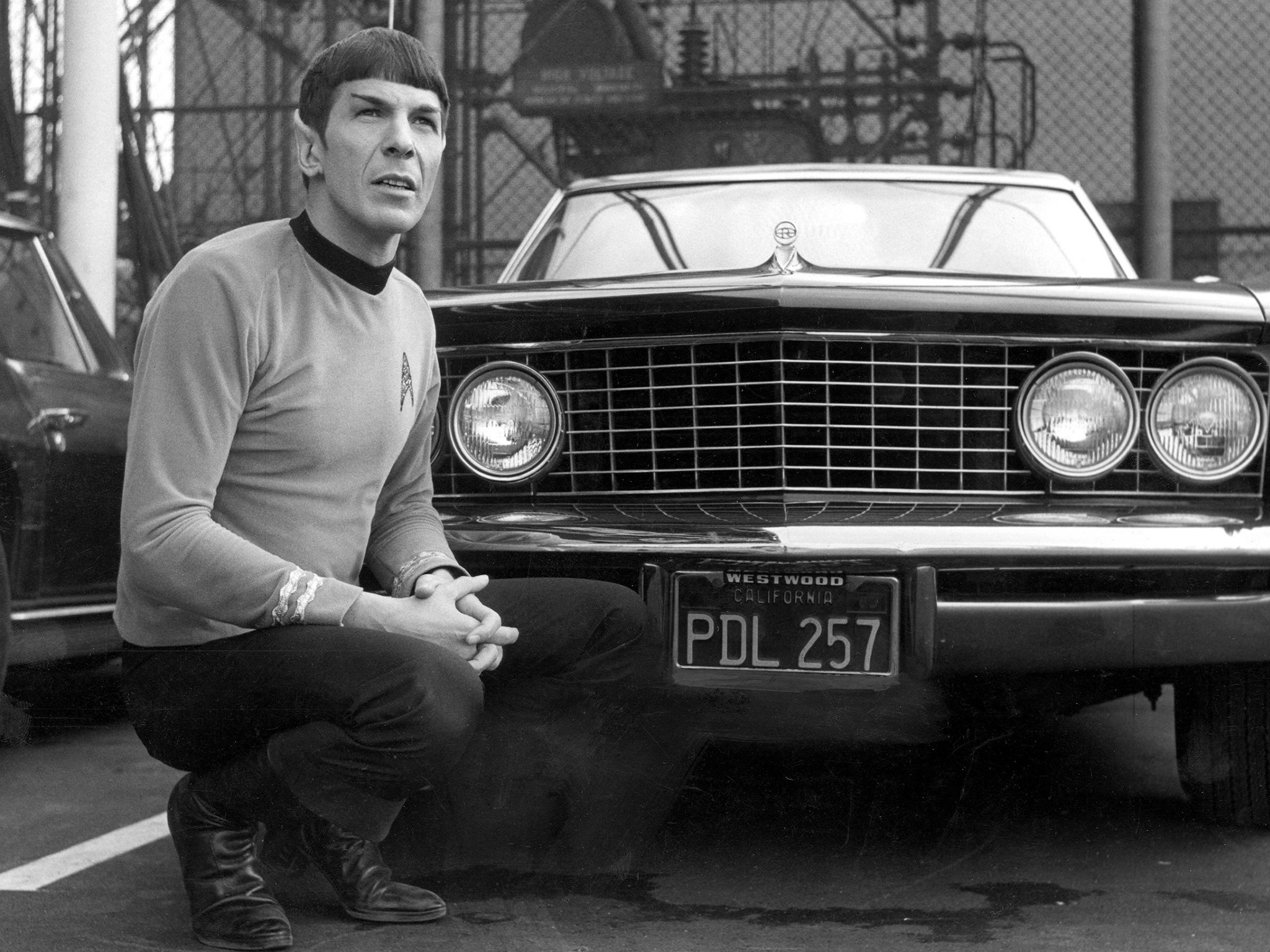 Leonard Nimoy in his 'Spock' costume with his Buick Riviera, 1965.