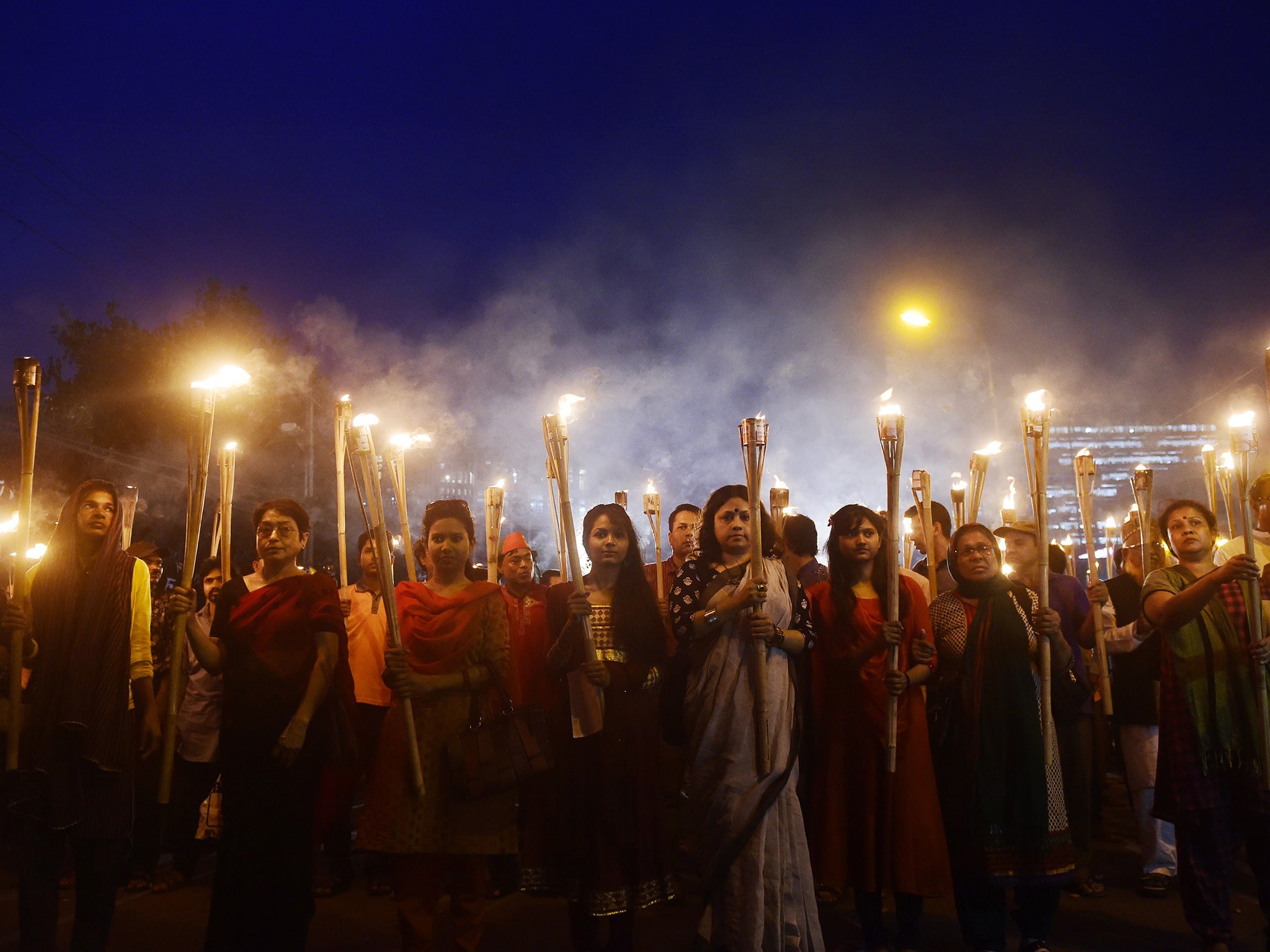 Students and teachers protest in Dhaka after Avijit Roy was hacked to death. A third blogger has been killed in a similar attack