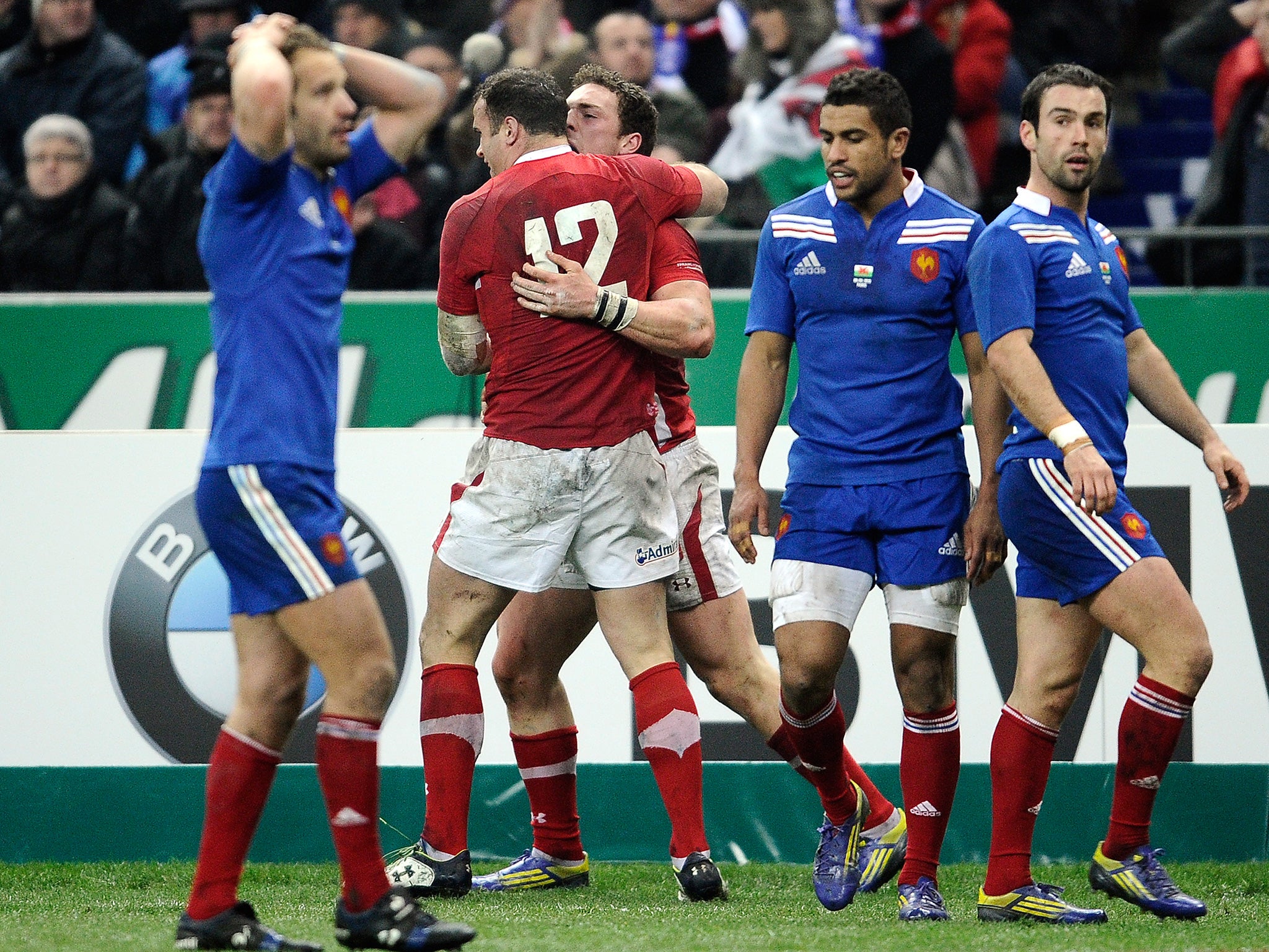 George North and Jamie Roberts celebrate Wales' victory in Paris in 2013