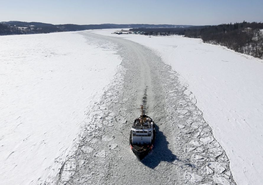 The U.S. Coast Guard cutter Sturgeon Bay breaks ice in the shipping channel on the Hudson River near Catskill, N.Y