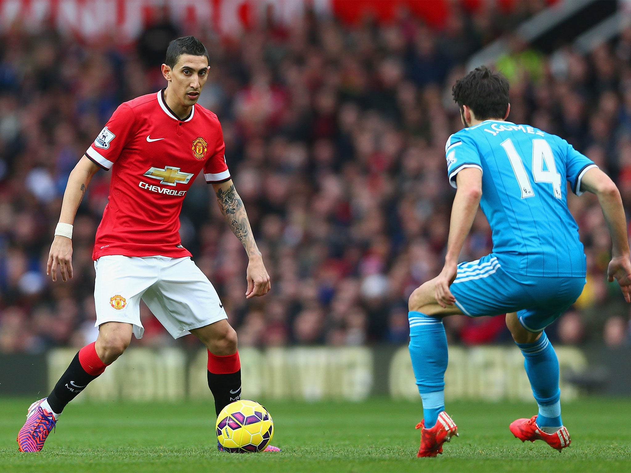 Angel di Maria tries to bamboozle Jordi Gomez