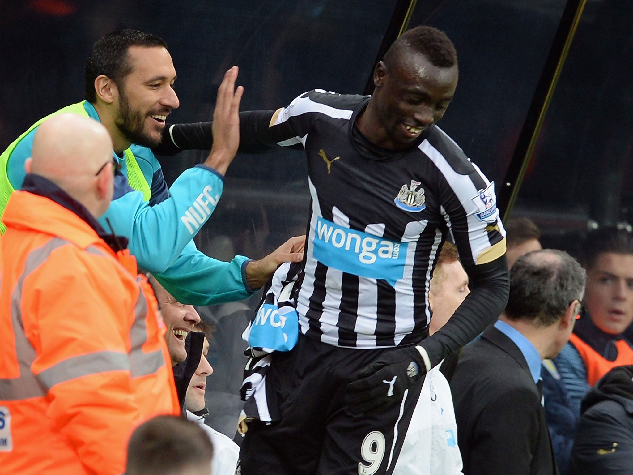 Papiss Cisse celebrates his goal against Aston Villa with Jonas Gutierrez