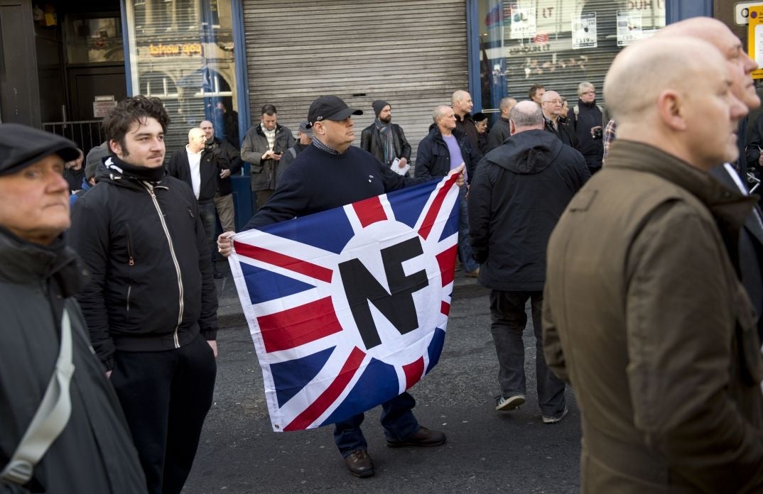 Banners included those of far-right groups including the National Front