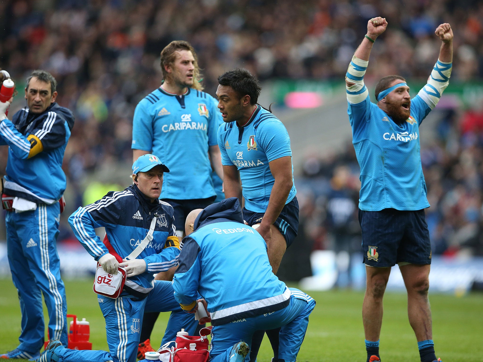 Italy celebrate scoring their second try