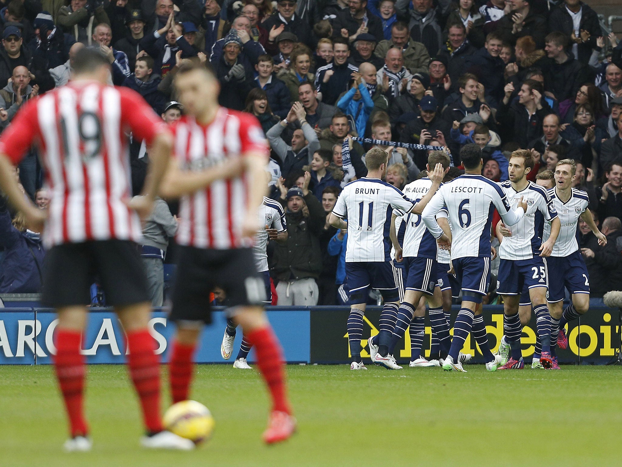 West Brom players celebrate Saido Berahino's goal