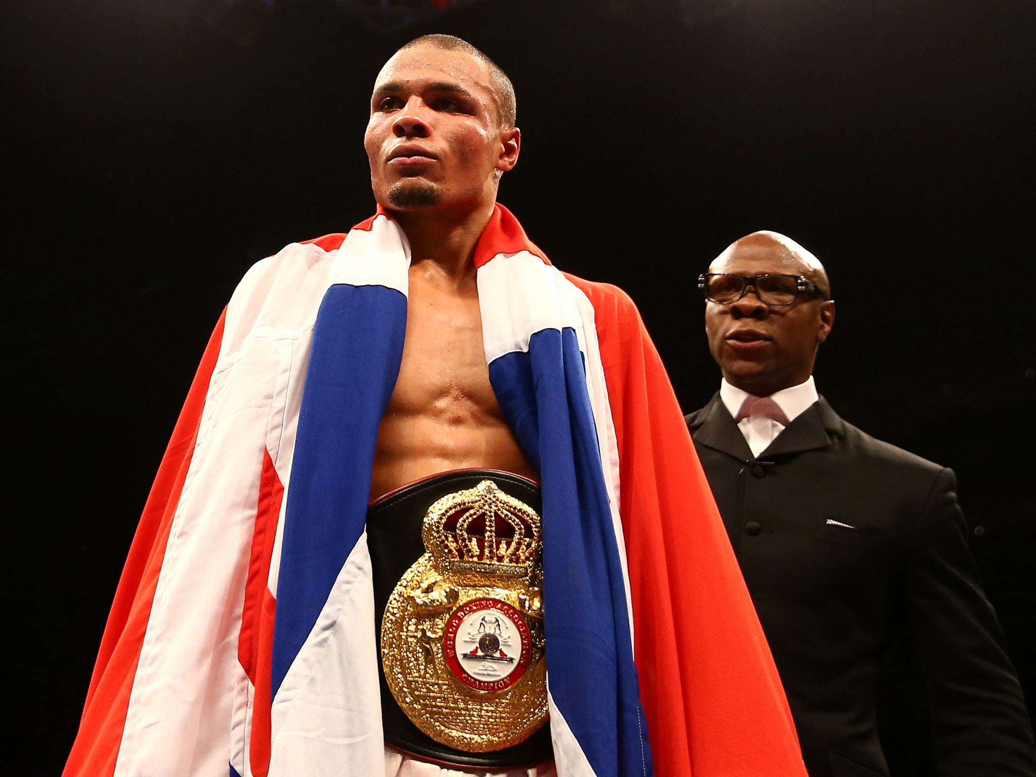 Chris Eubank Jr (left) and Sr celebrate the title-winning display