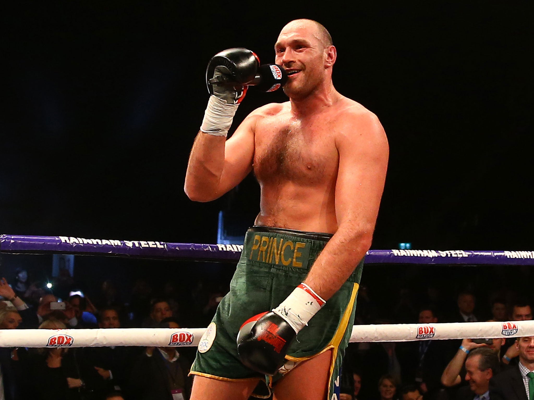 Tyson Fury serenades the crowd after his victory