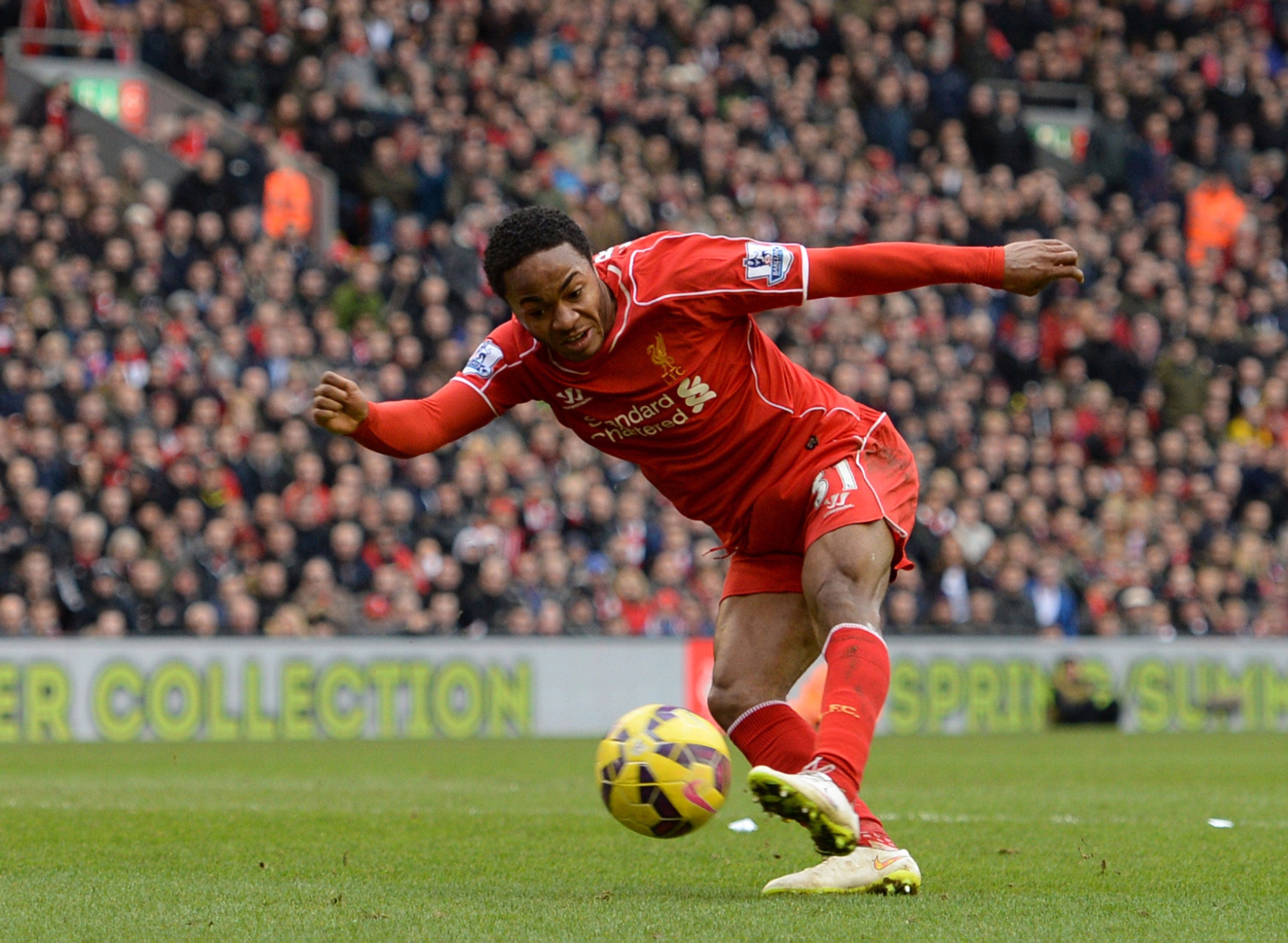 Raheem Sterling goes for goal