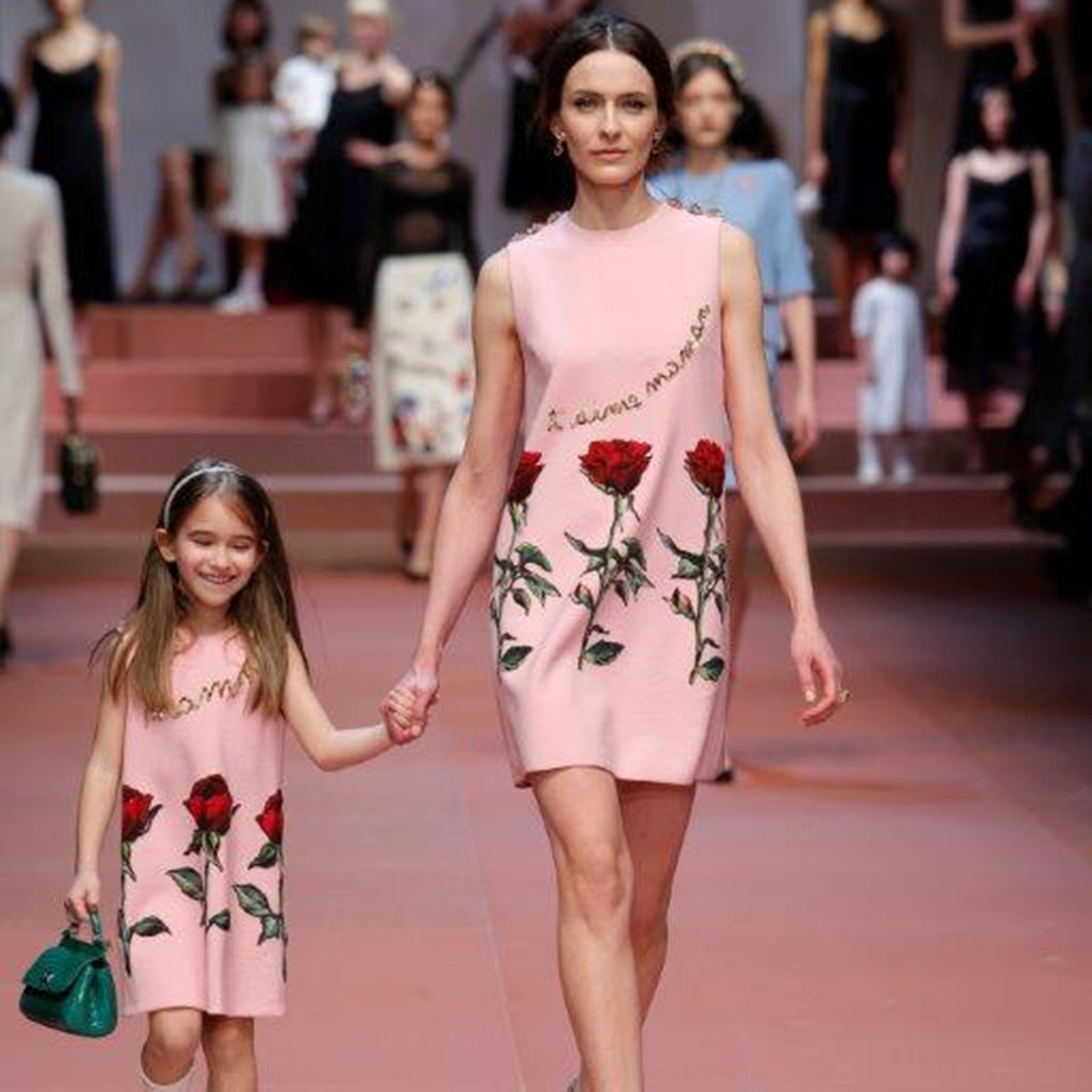 A mother and child from Dolce and Gabbana's autumn/winter 2015 show