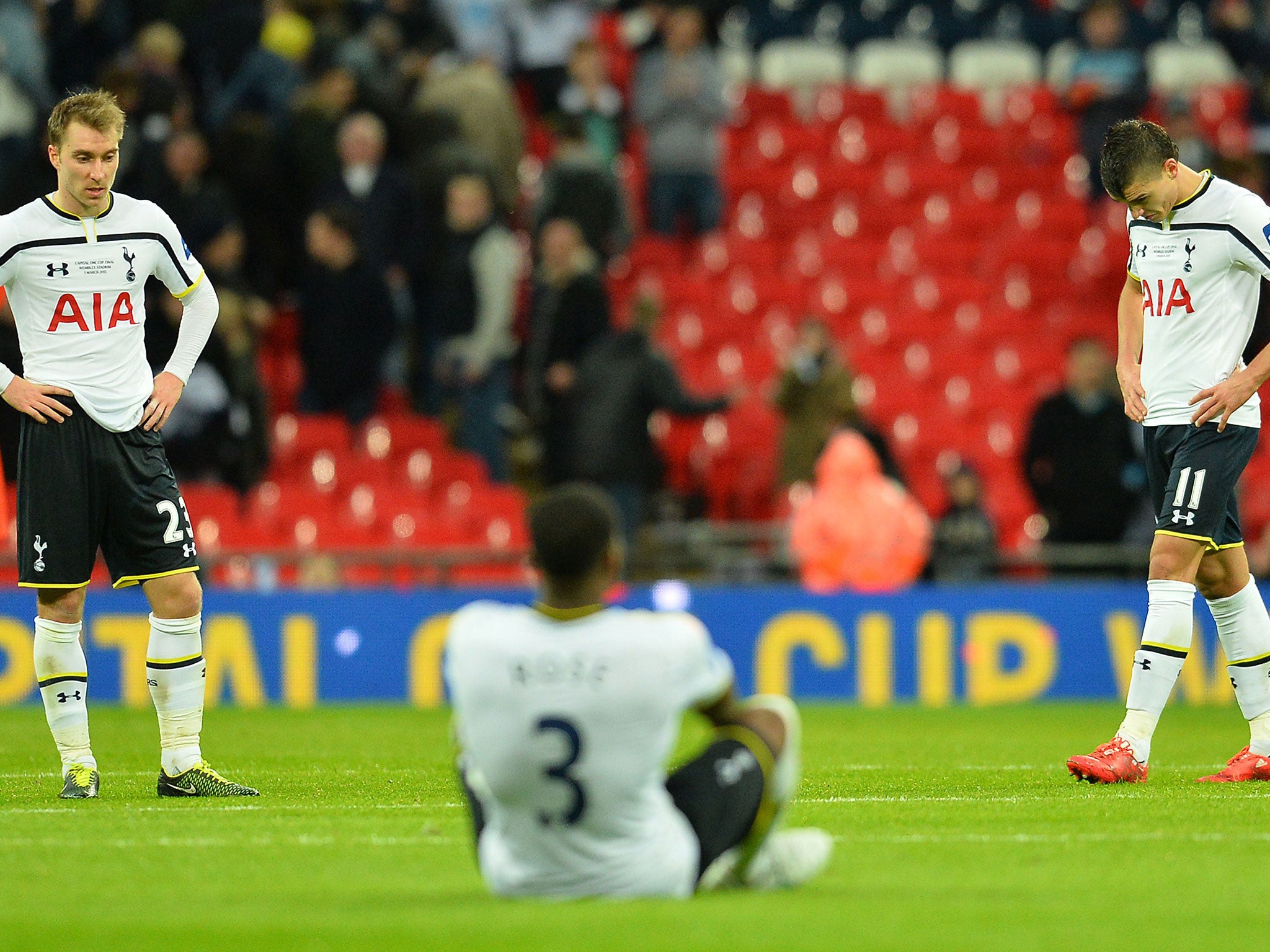 Tottenham players react after the match