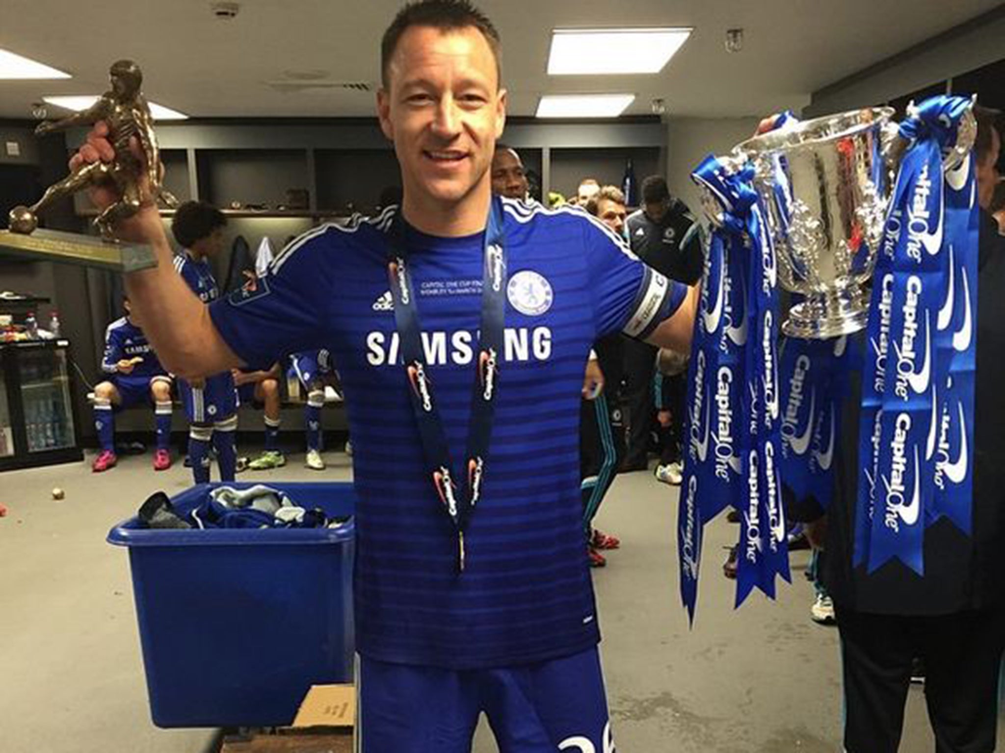 Terry with his man of the match award and the trophy