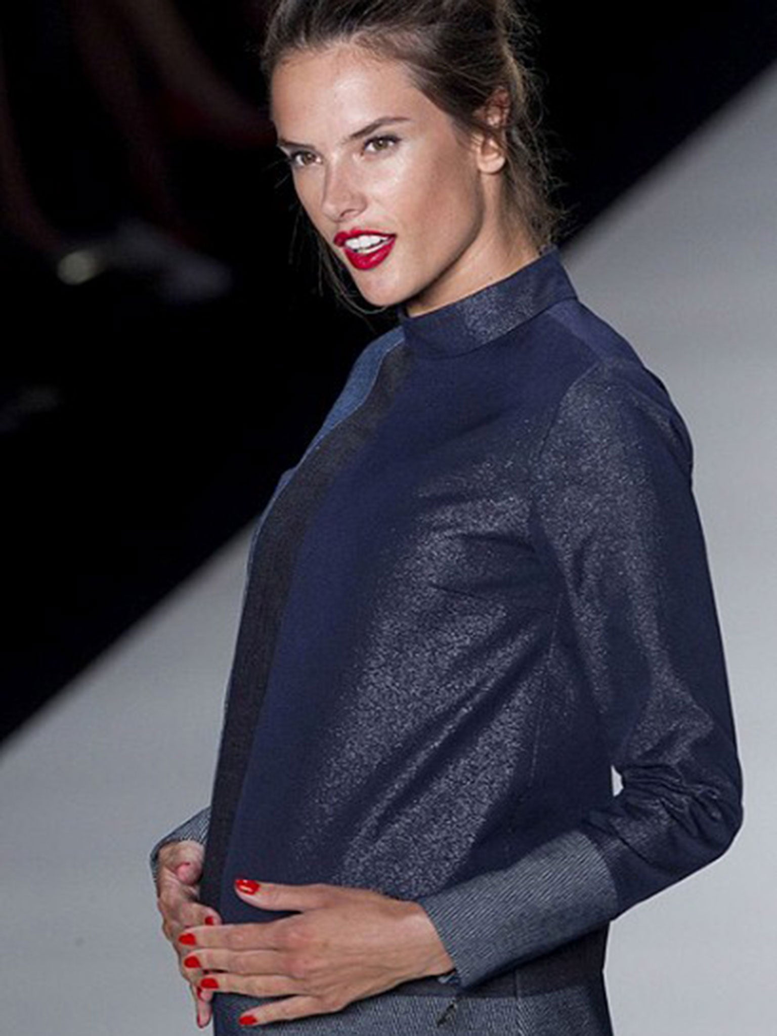 Brazilian model Alessandra Ambrosio, who was five months pregnant, on the catwalk of Colcci during the Sao Paulo Fashion Week in 2012