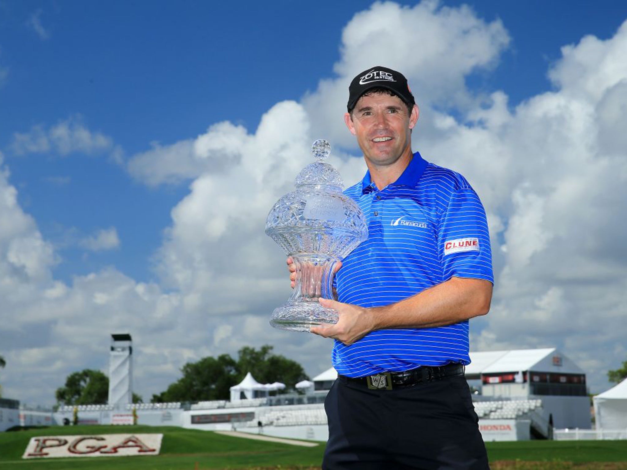 Padraig Harrington shows off the Honda Classic trophy on Monday