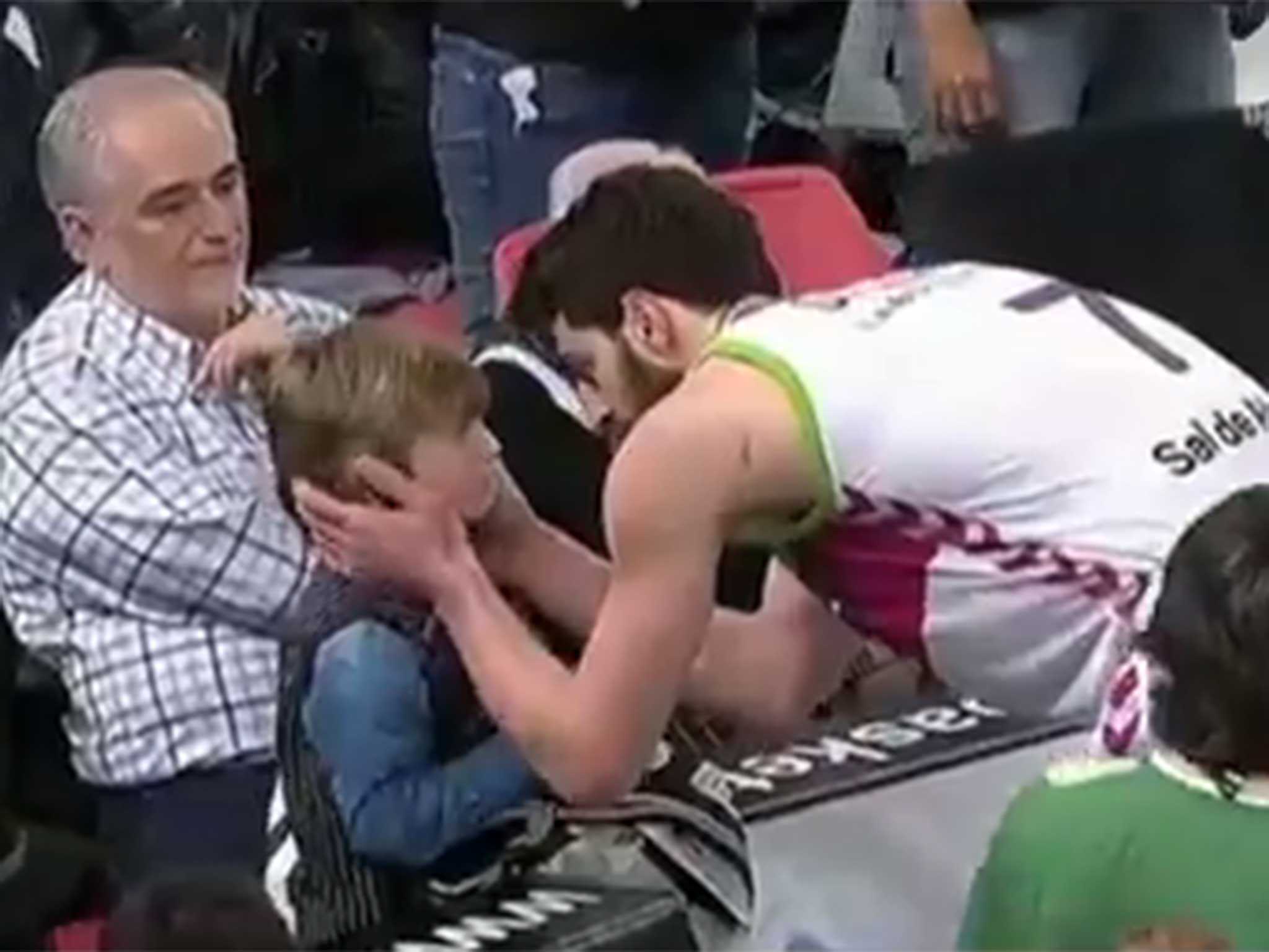 Tornike Shengelia took a moment to check the child was alright before being sent off