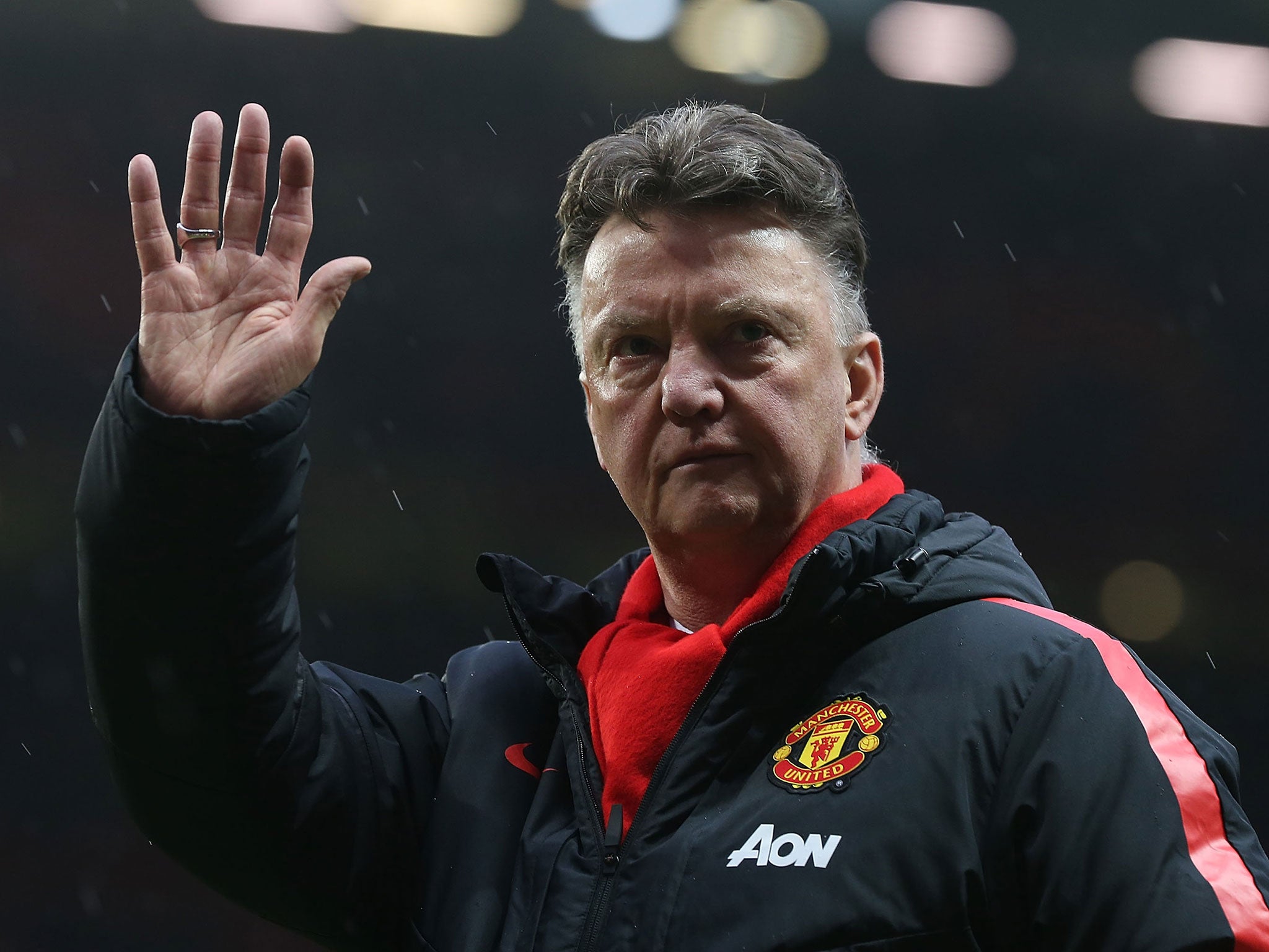 Van Gaal waves to the United fans after the 2-0 win over Sunderland