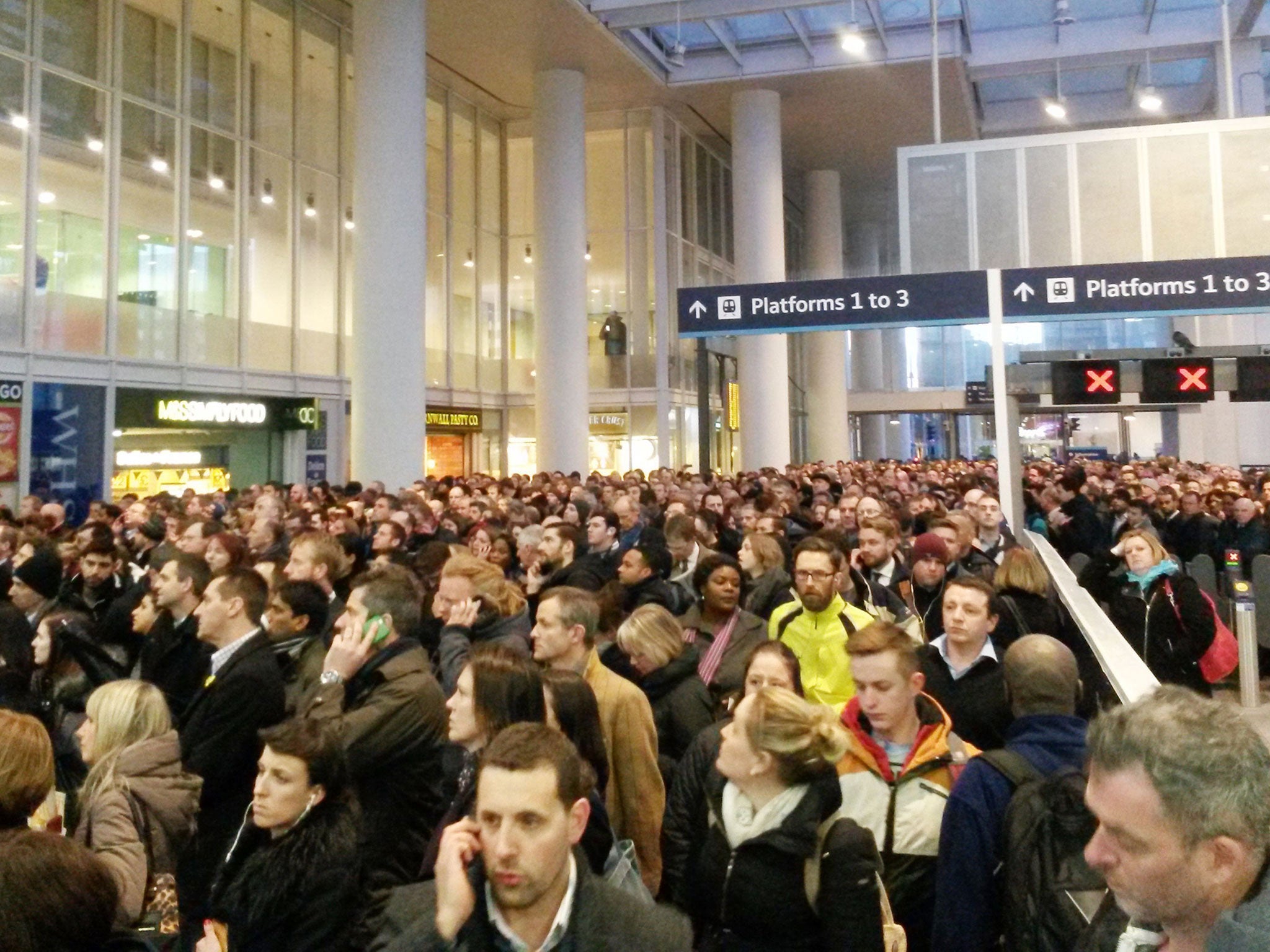 Passengers at London Bridge station last month, as unions and politicians called for urgent action to avoid a repeat of the 'life threatening chaos'