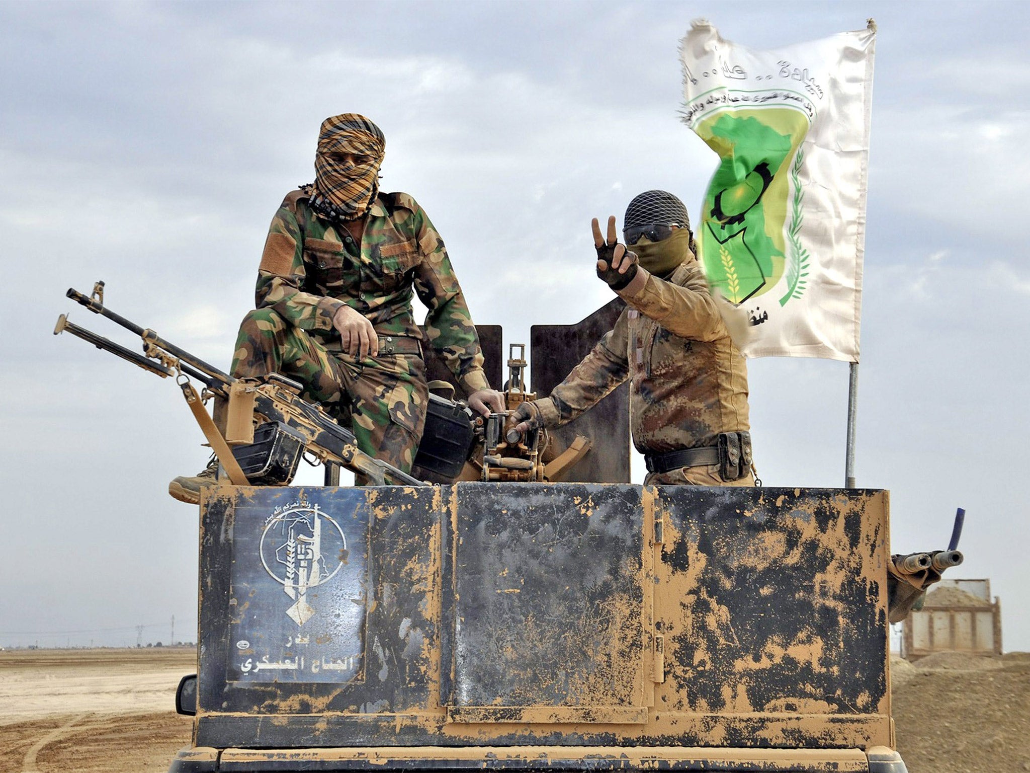 Iraqi Shias of the Badr Army militia take up position near Samara, northern Iraq, amid reports that Baghdad’s forces are poised to advance on Tikrit as their offensive goes on