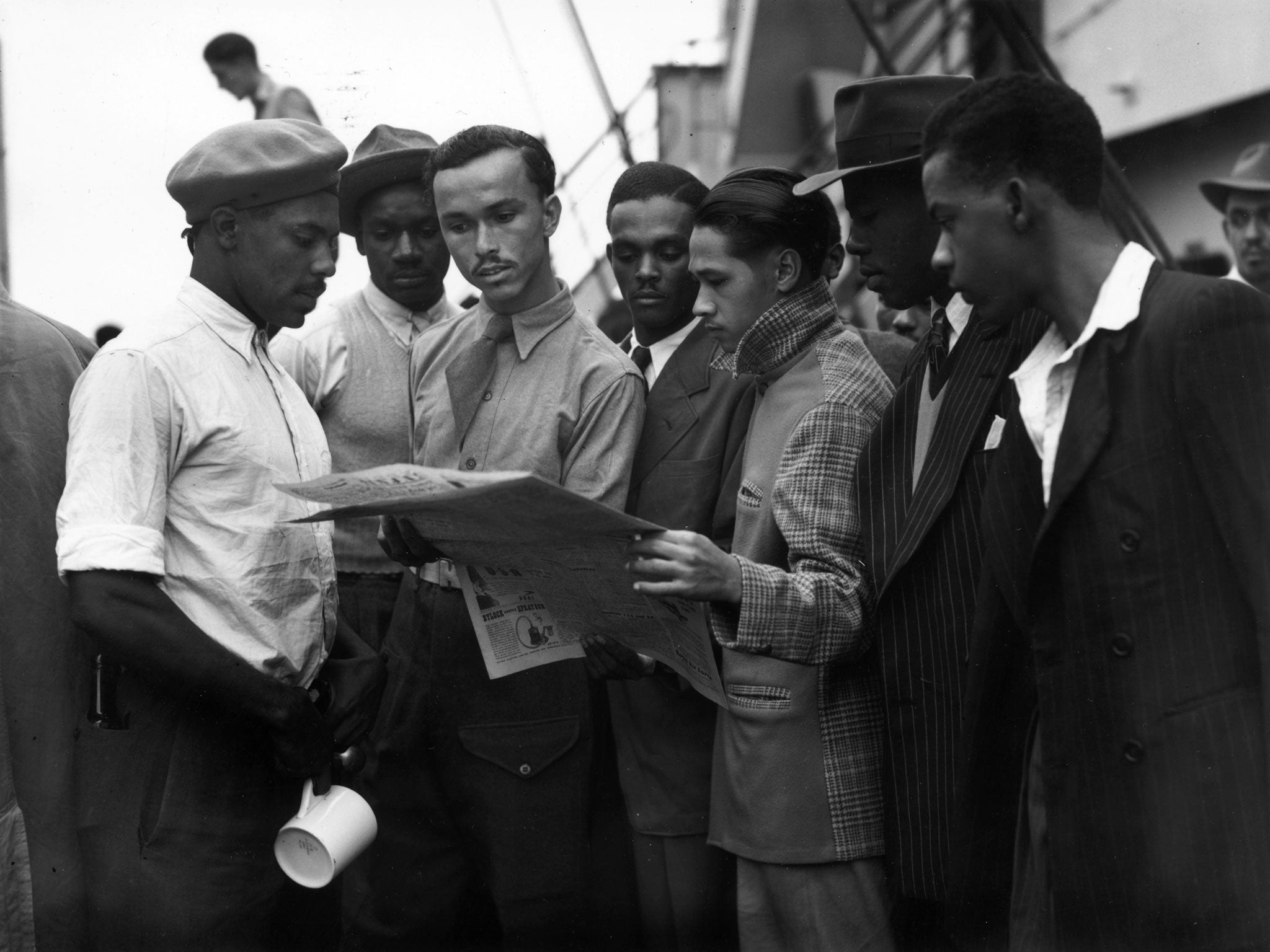 A new life: A group of Jamaican men on board the 'Empire Windrush' bound for Tilbury docks in 1948