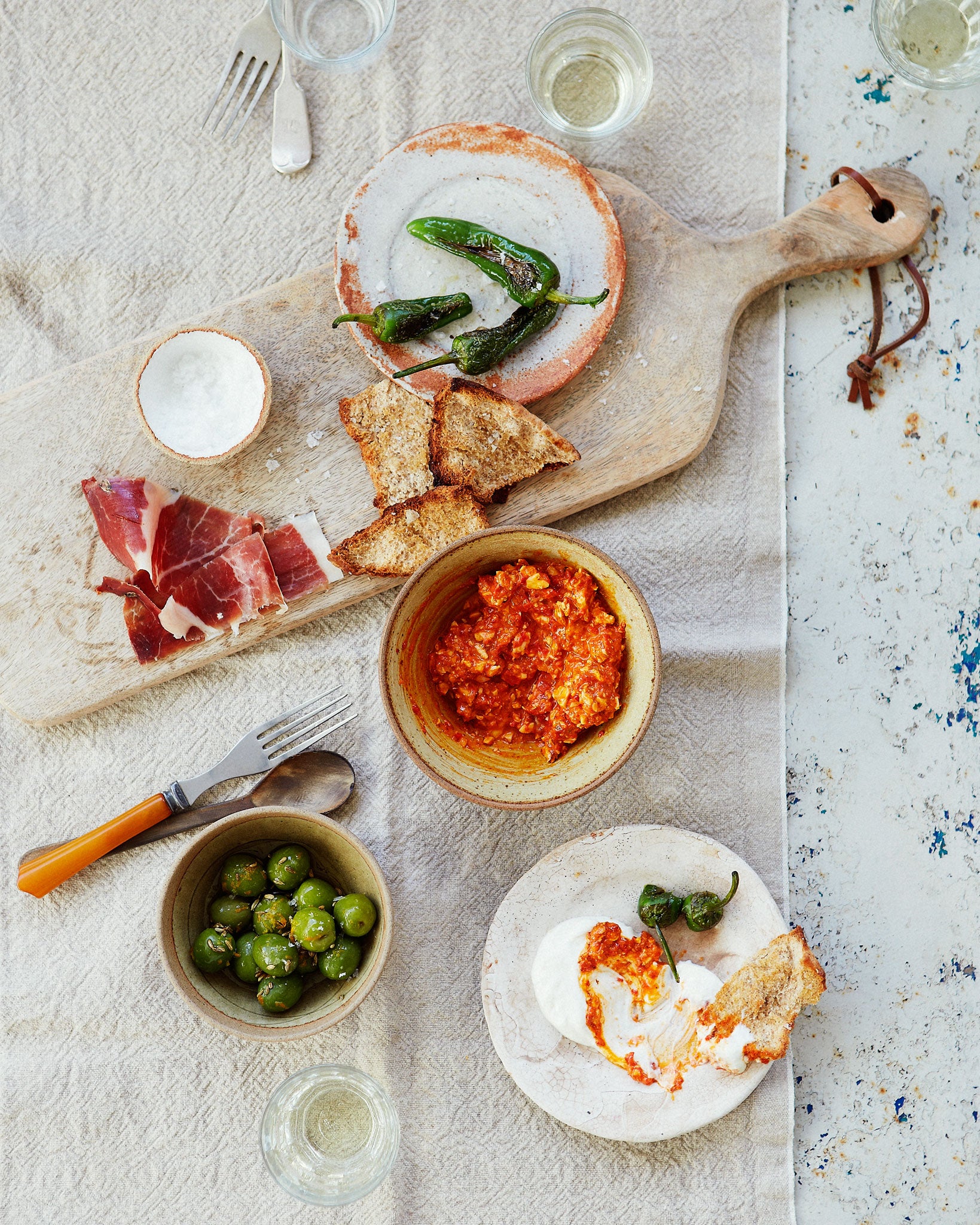 Go easy on the marinated olives, padron peppers, romesco sauce and whipped ricotta