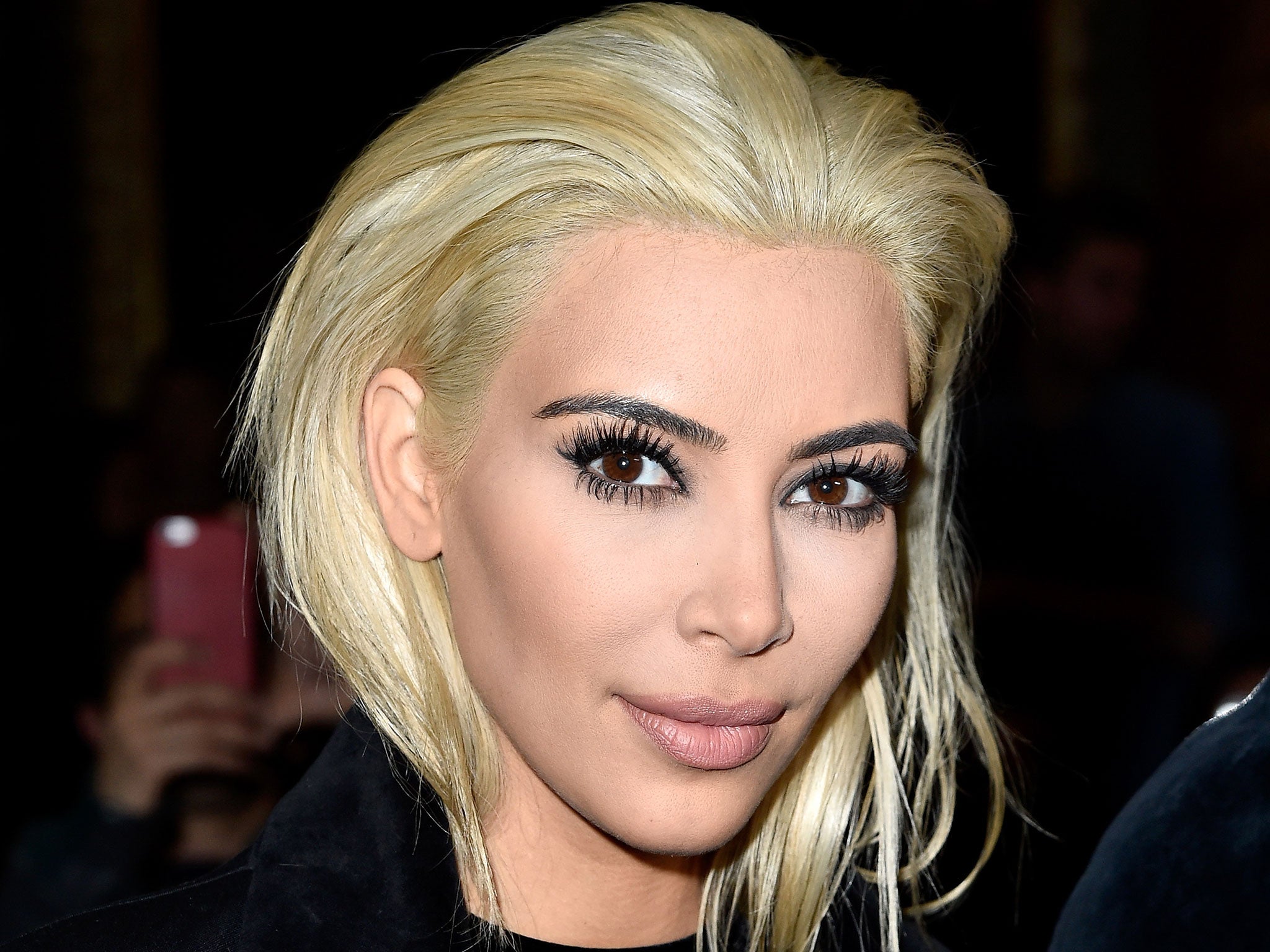 Kim Kardashian debuts her newly dyed blonde her during Paris Fashion Week