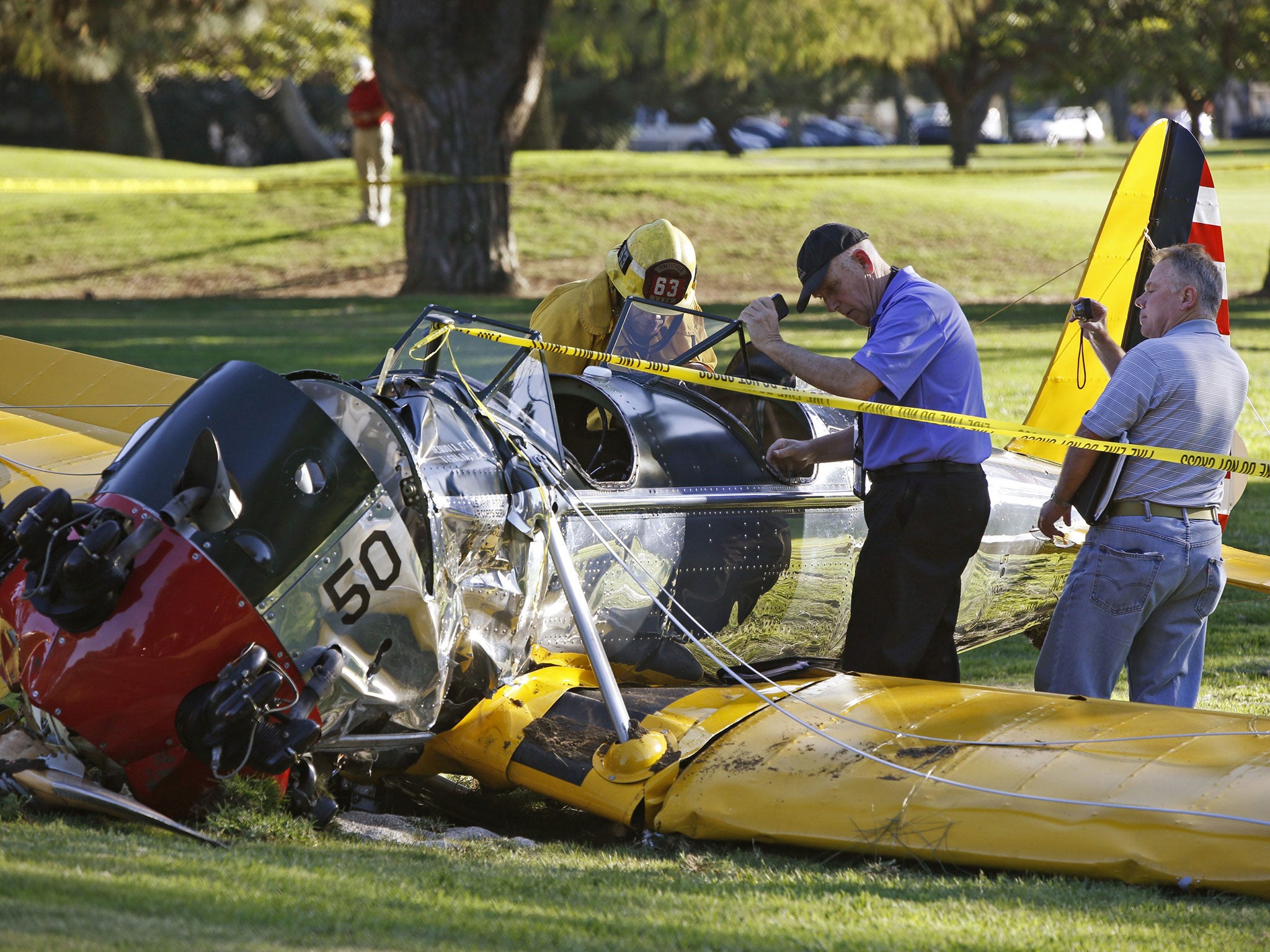 Officials work on the scene at Penmar Golf Course