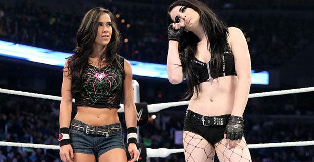 AJ stares at Paige after seeing off Brie Bella