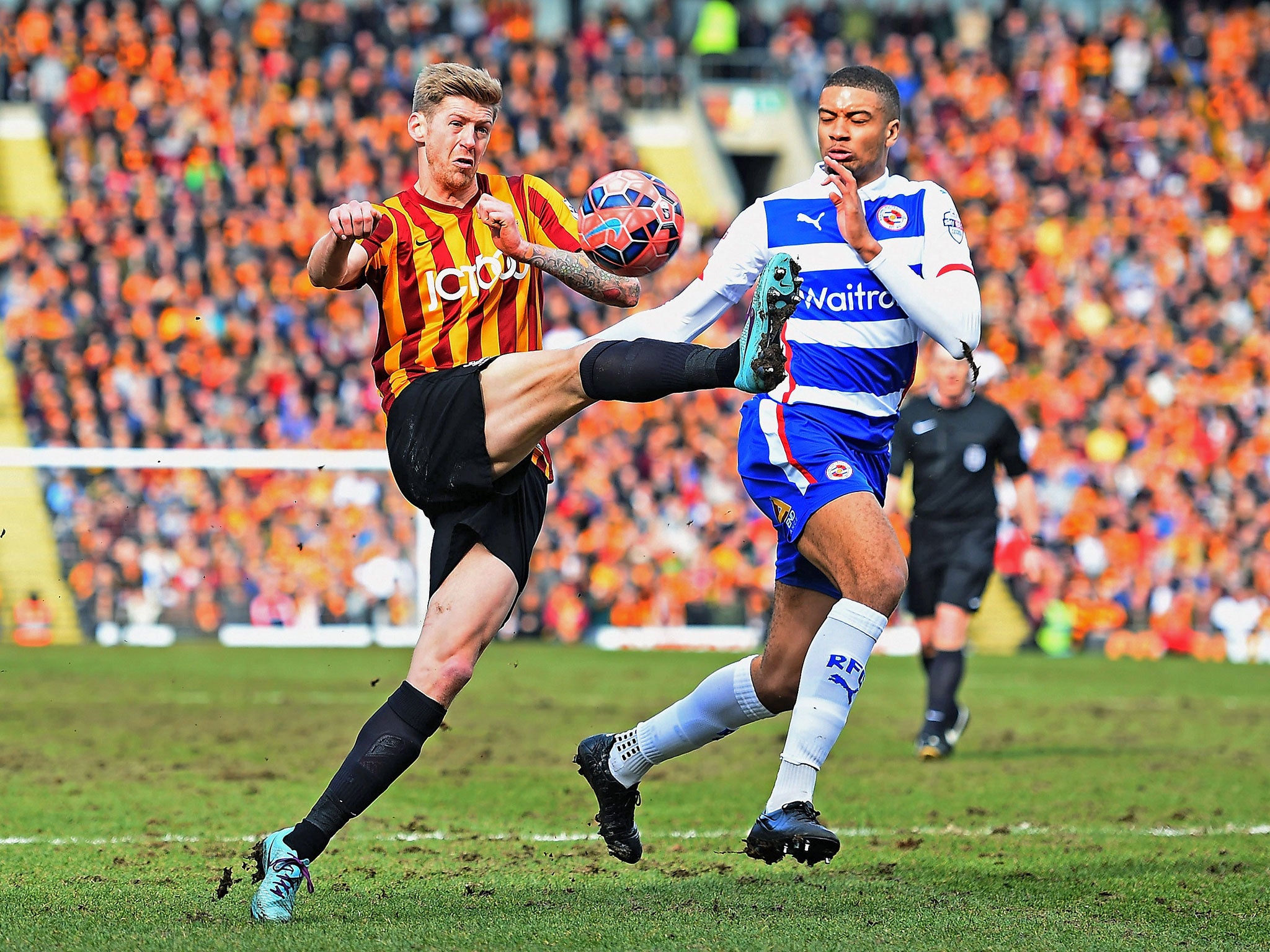 Jon Stead (left) battles with Michael Hector