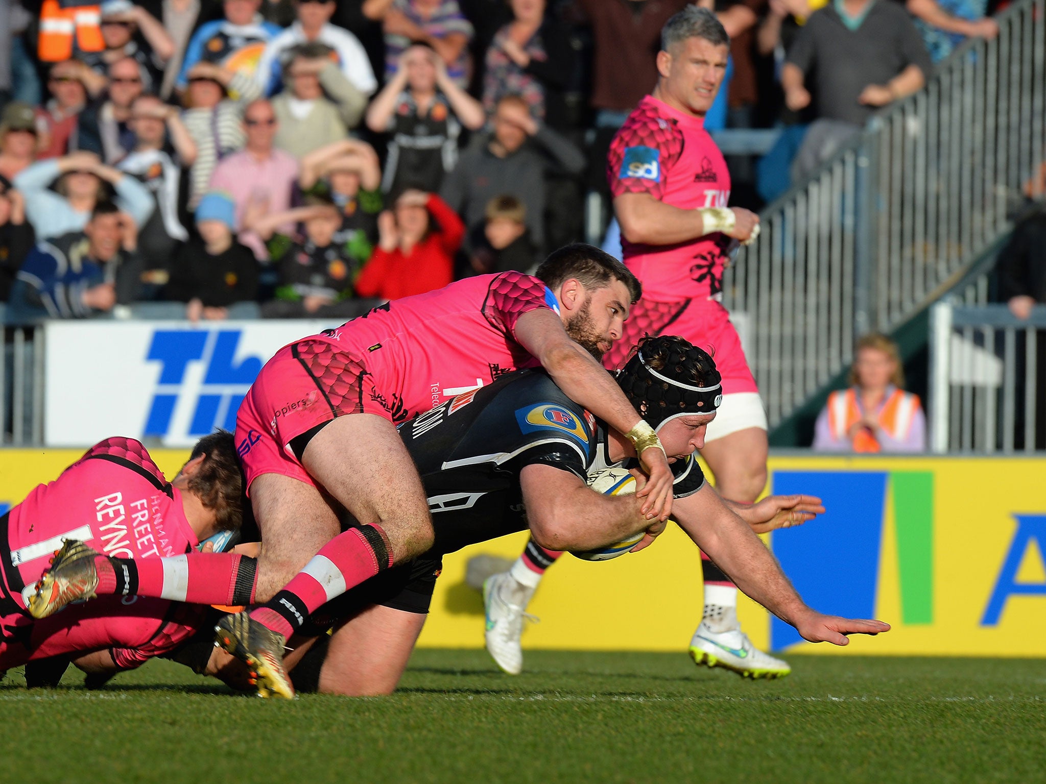 Thomas Waldrom dives over the line to score a try