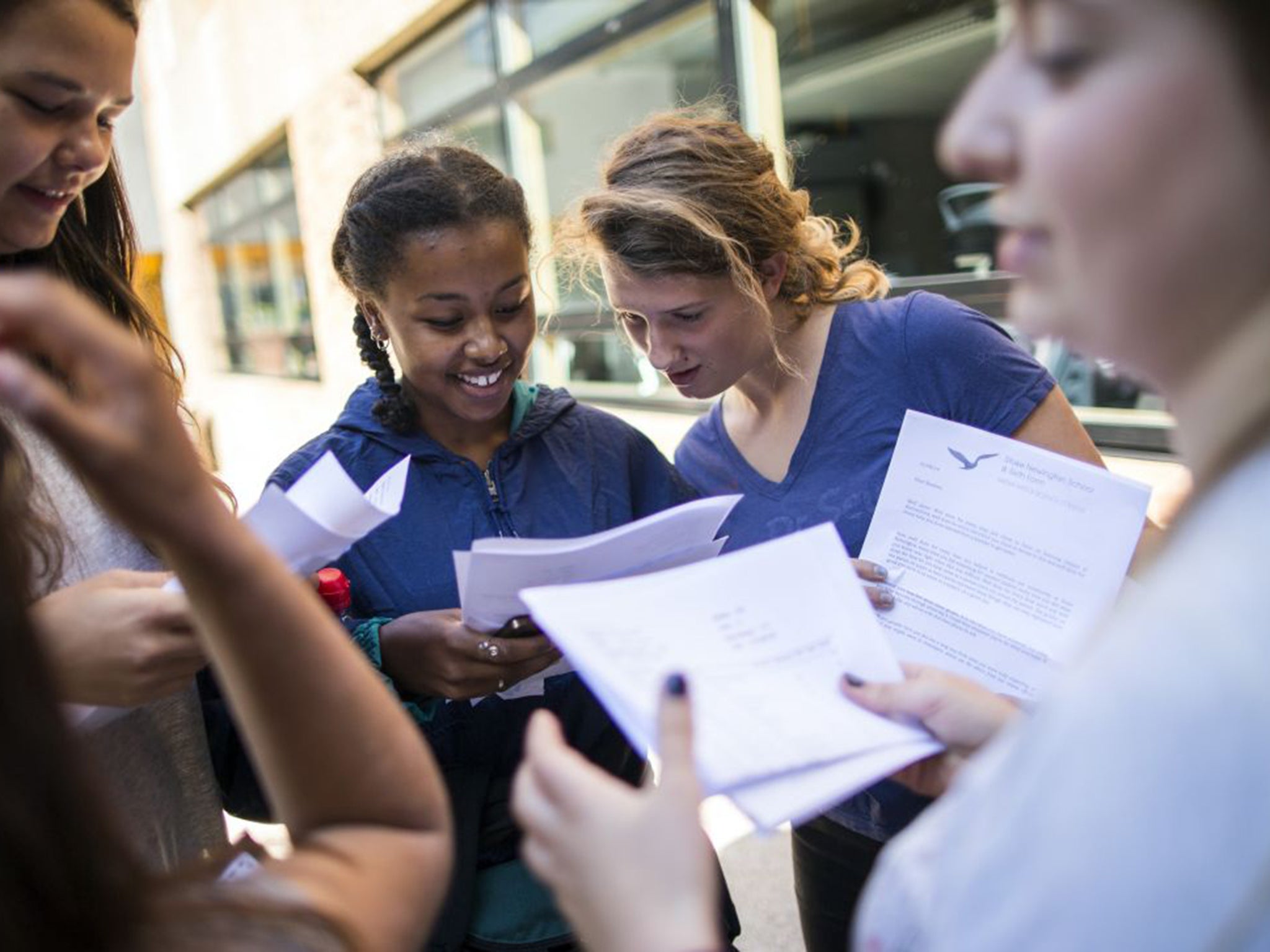 Girls in north London get their GCSE results last summer