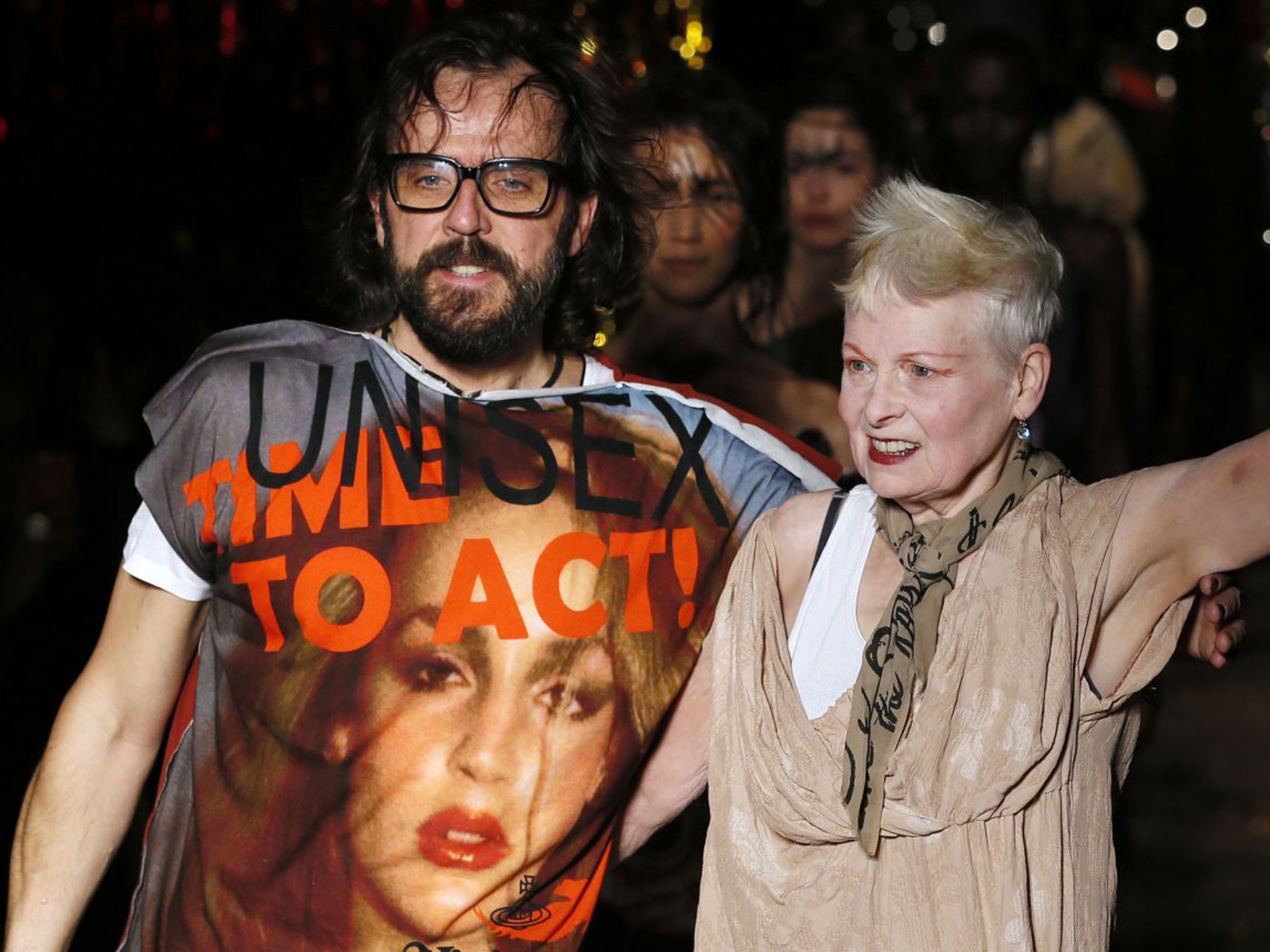 Vivienne Westwood acknowledges the public with her husband Andreas Kronthaler