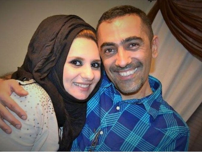 Ahmed Al-Jumaili, pictured with his wife, was shot and killed while he was watching snow fall for the first time