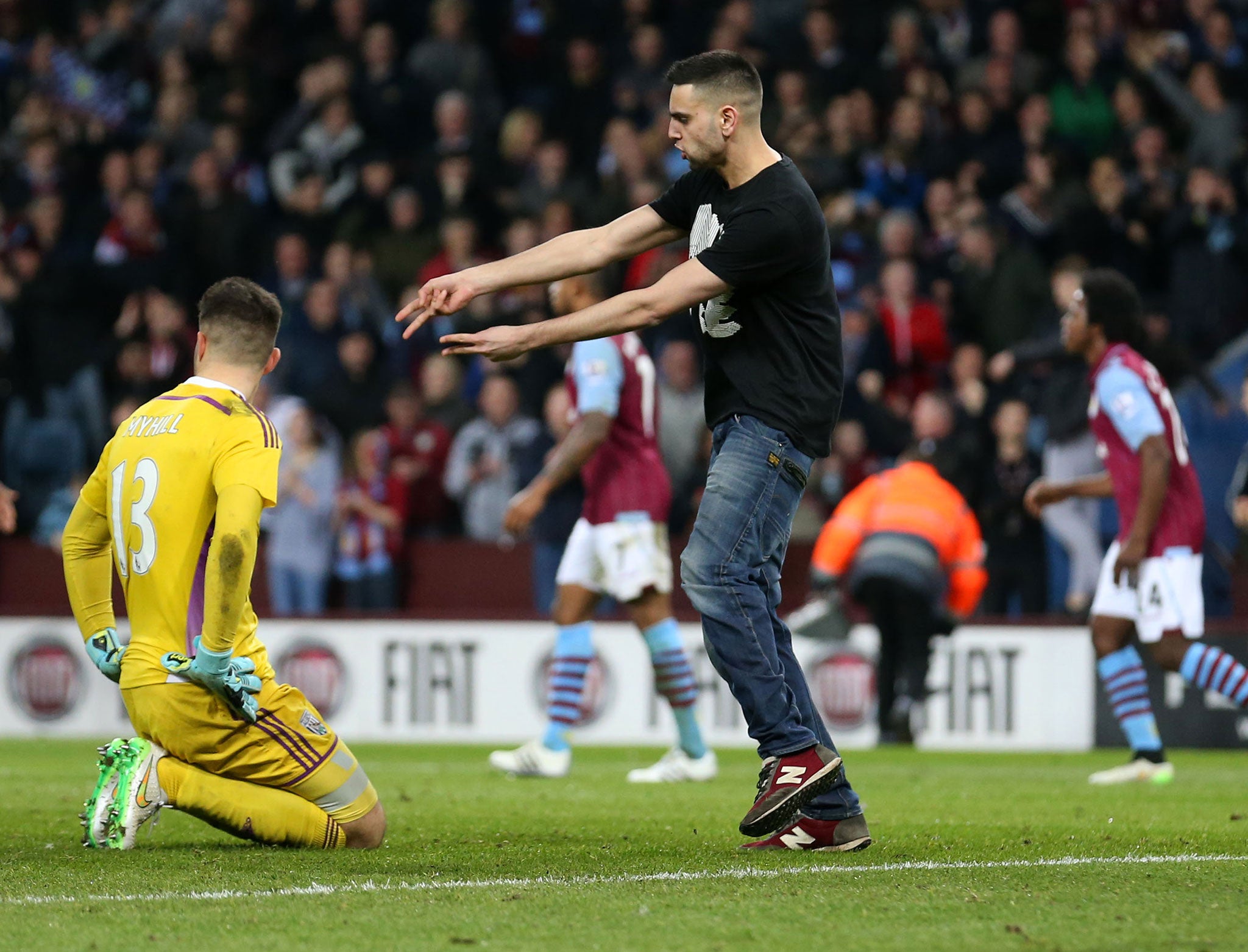 West Bromwich goalkeeper Boaz Myhill faces the taunting of an Aston Villa fan