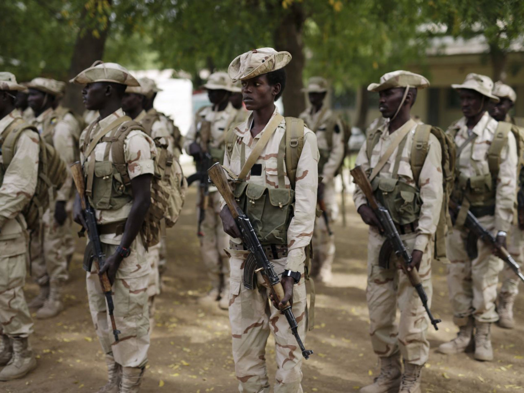 Chadian troops participate in the closing ceremony in an army base in N'djamena, Chad; ten Chadian soldiers have died during fighting with Boko Haram in Northern Nigeria