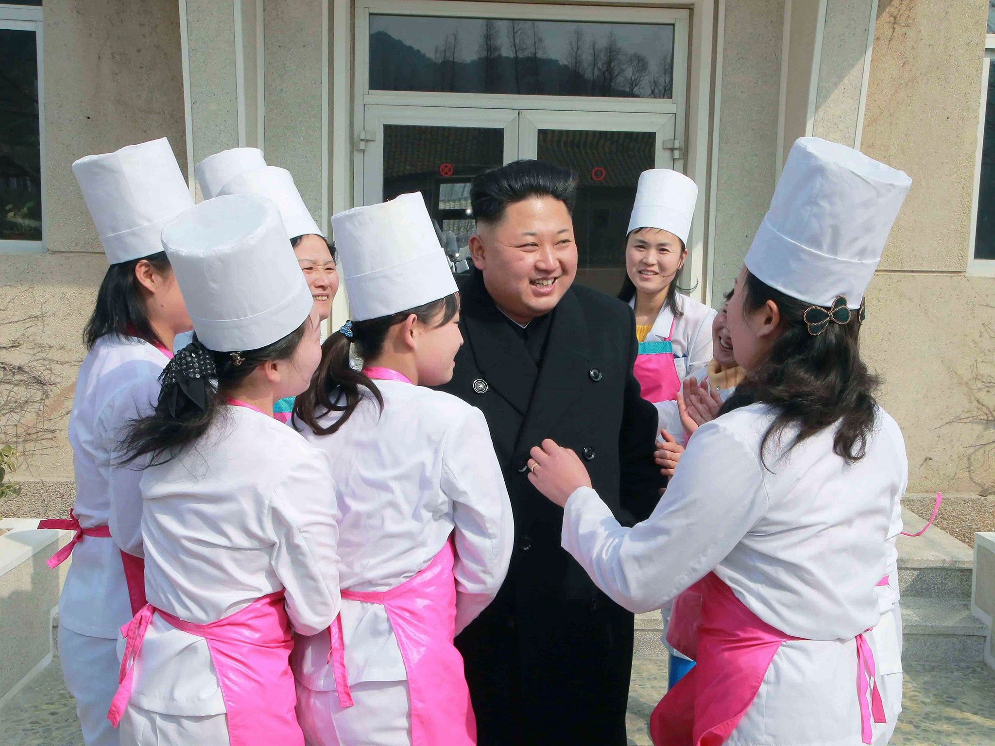 North Korean leader Kim Jong Un smiles during his inspection of Unit 1016 of KPA (Korean People's Army) Air and Anti-Air Force honored with the Title of O Jung Hup-led 7th Regiment, in Pyongyang