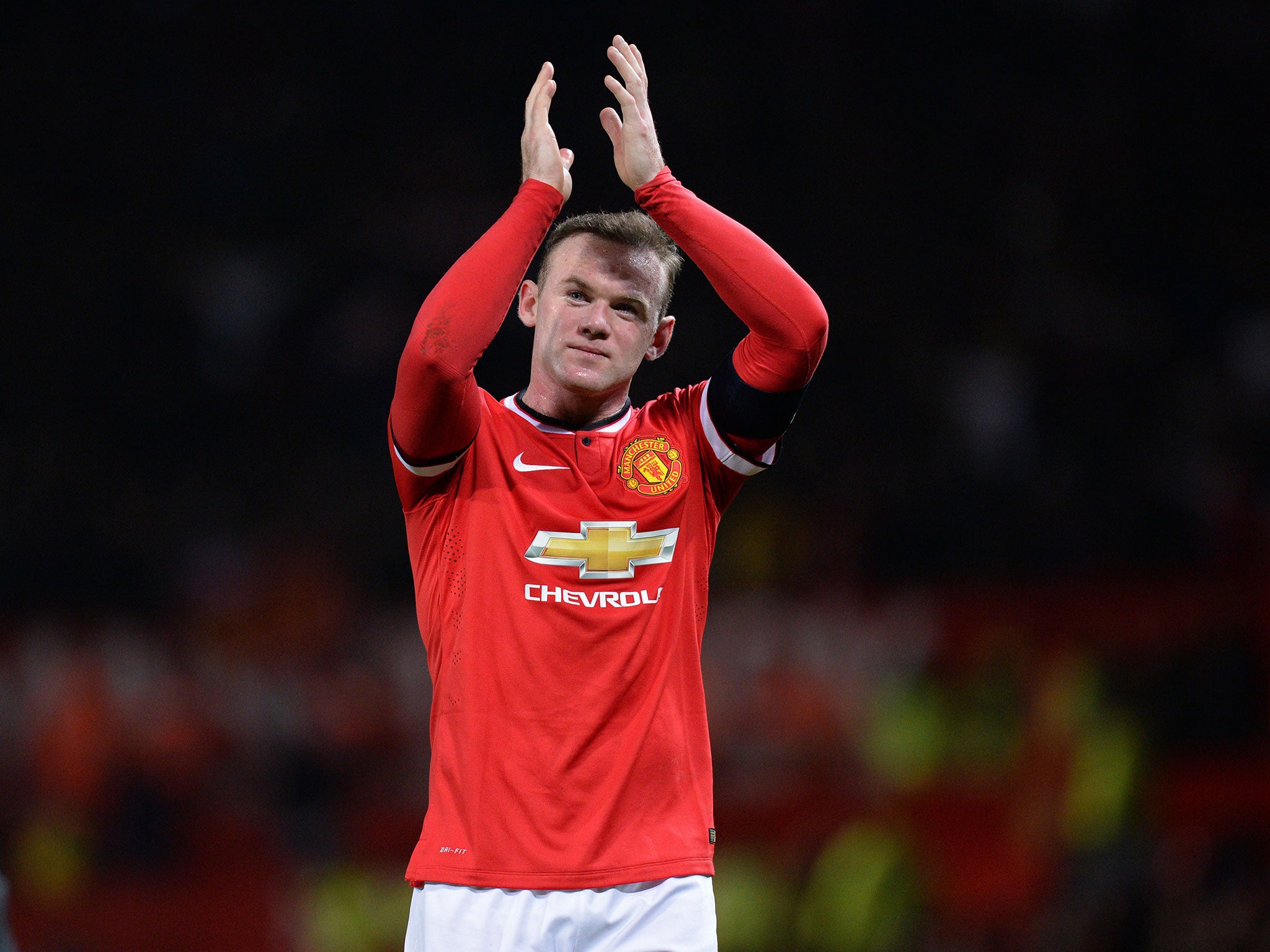 Rooney applauds the United support