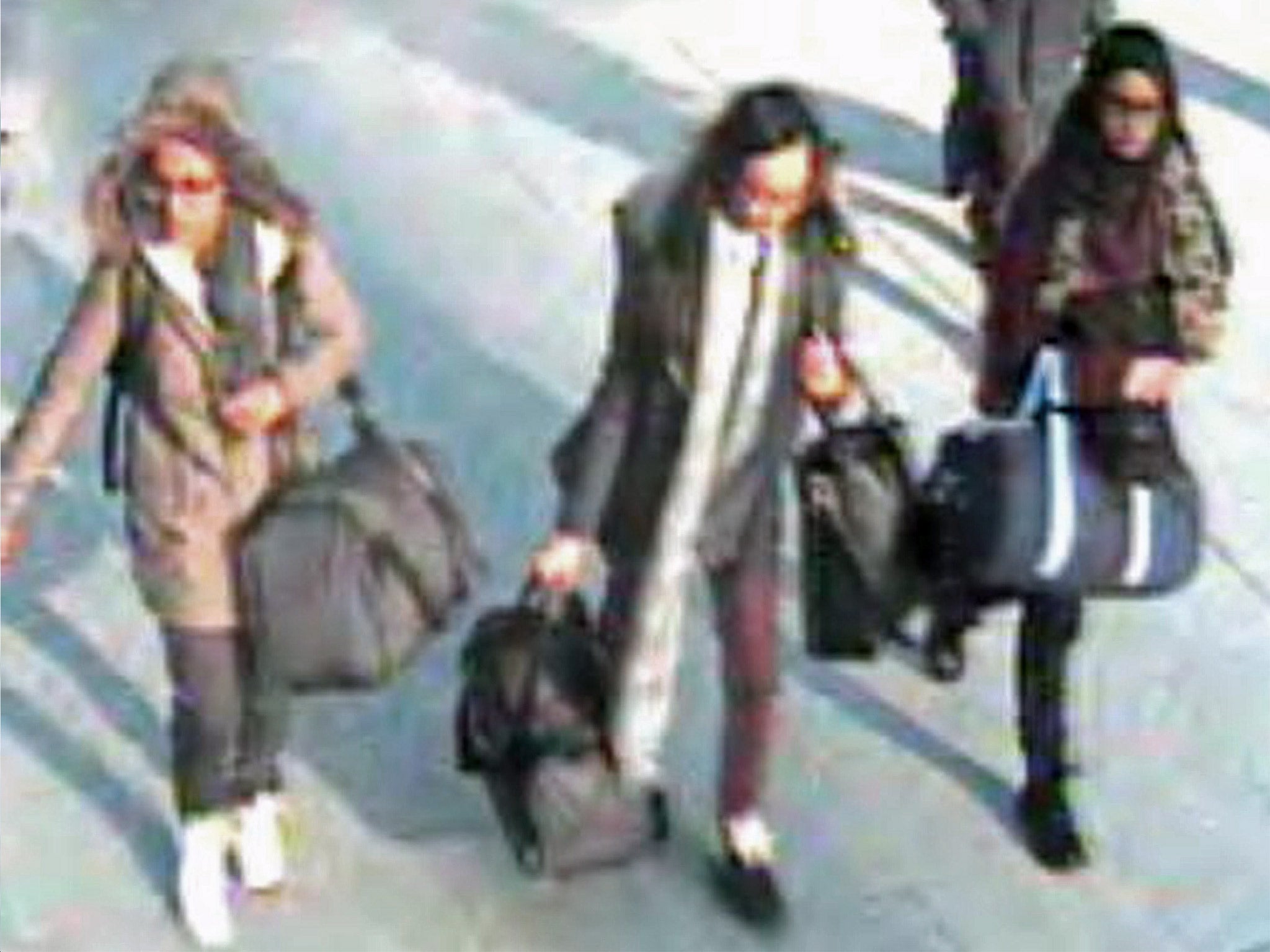 Left to right: Amira Abase, Kadiza Sultana and Shamima Begum caught on CCTV at Gatwick airport on their way to Turkey