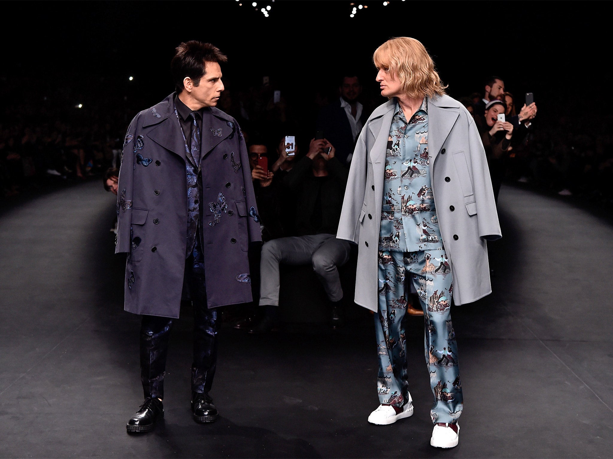 Derek Zoolander (Ben Stiller) and Hansel (Owen Wilson) walk the runway at the Valentino show, promoting ‘Zoolander 2’