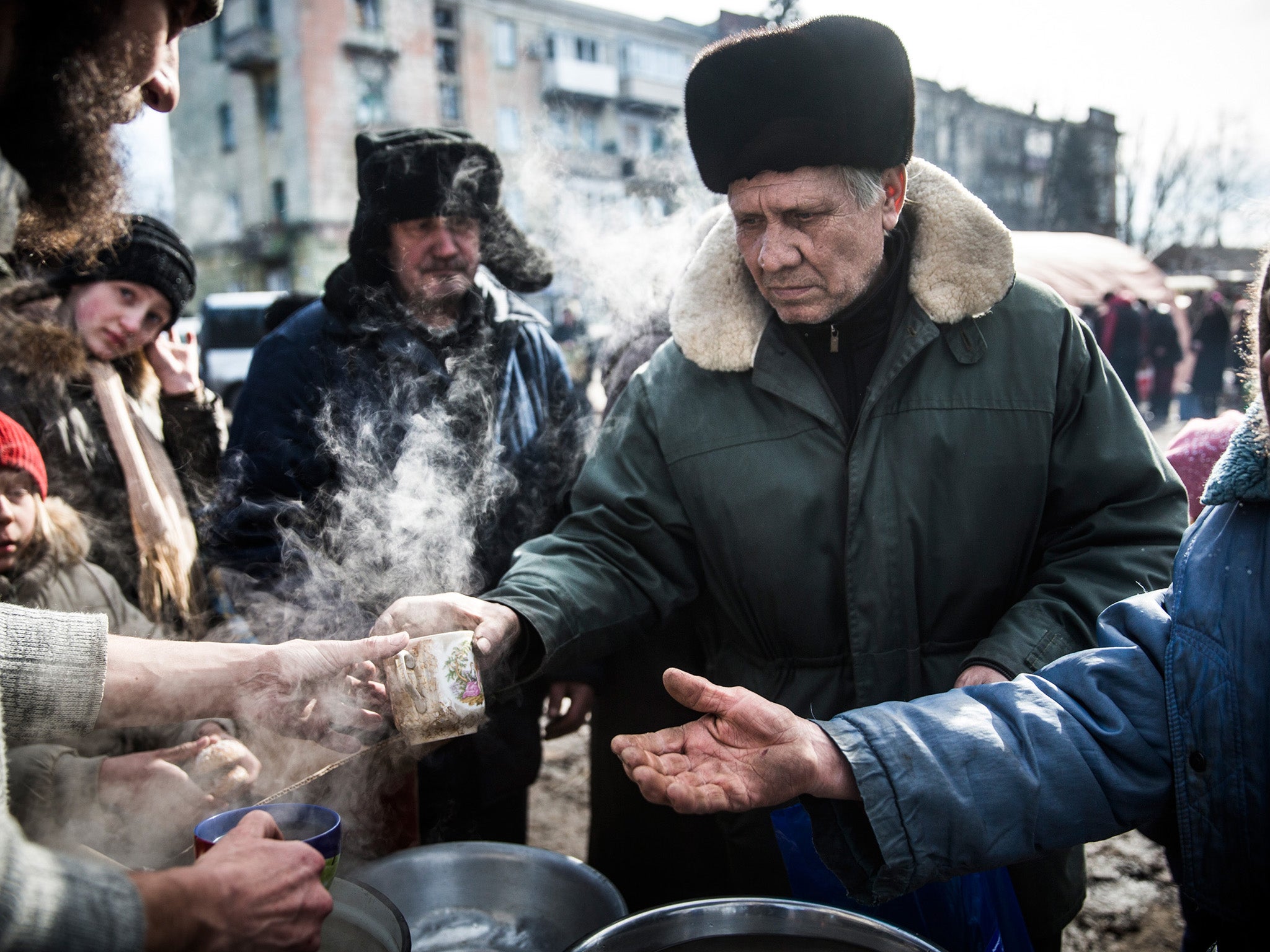 A man salvages cinder blocks in Debaltseve.