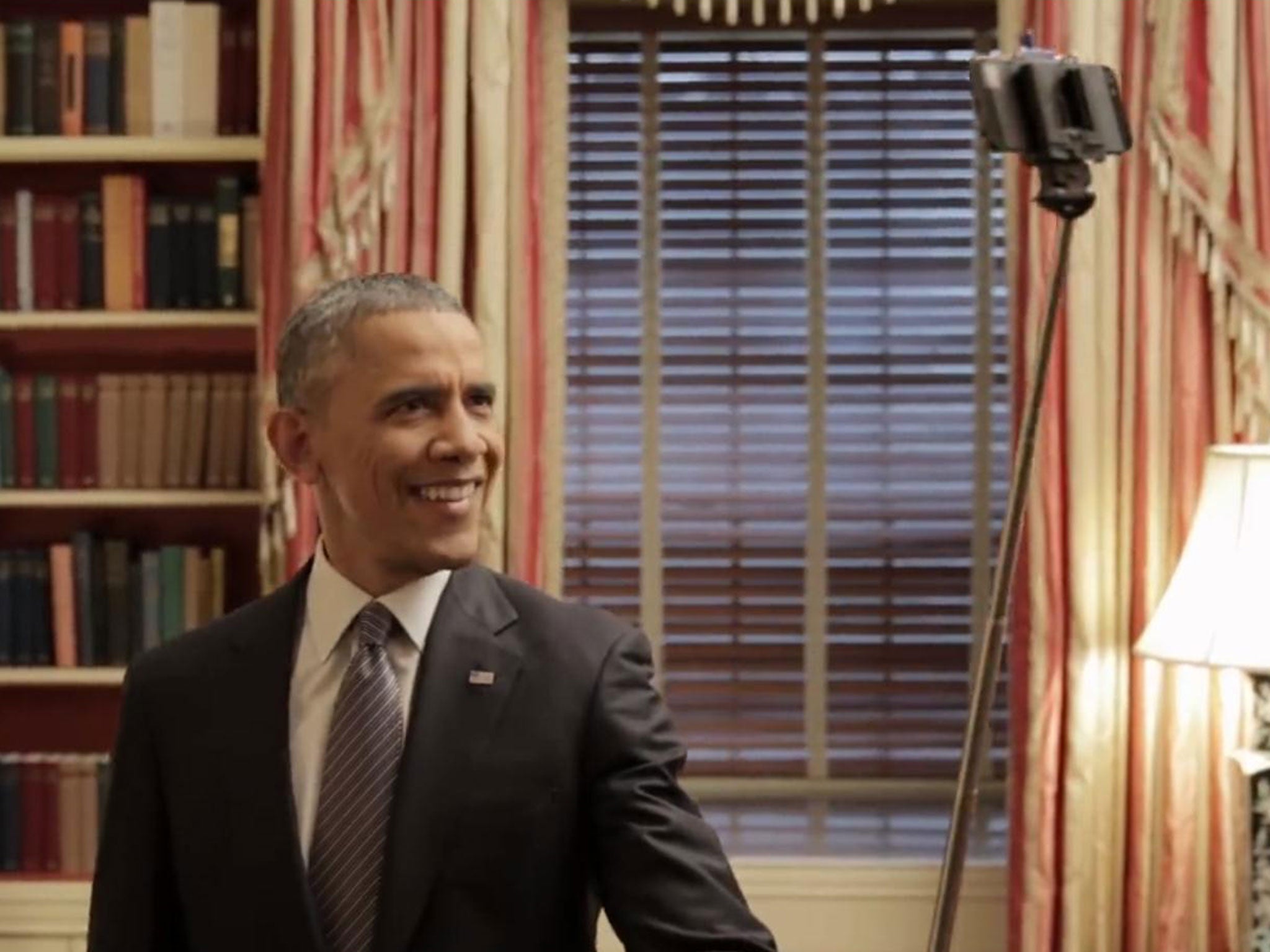 Barack Obama using a selfie stick in a Buzzfeed video