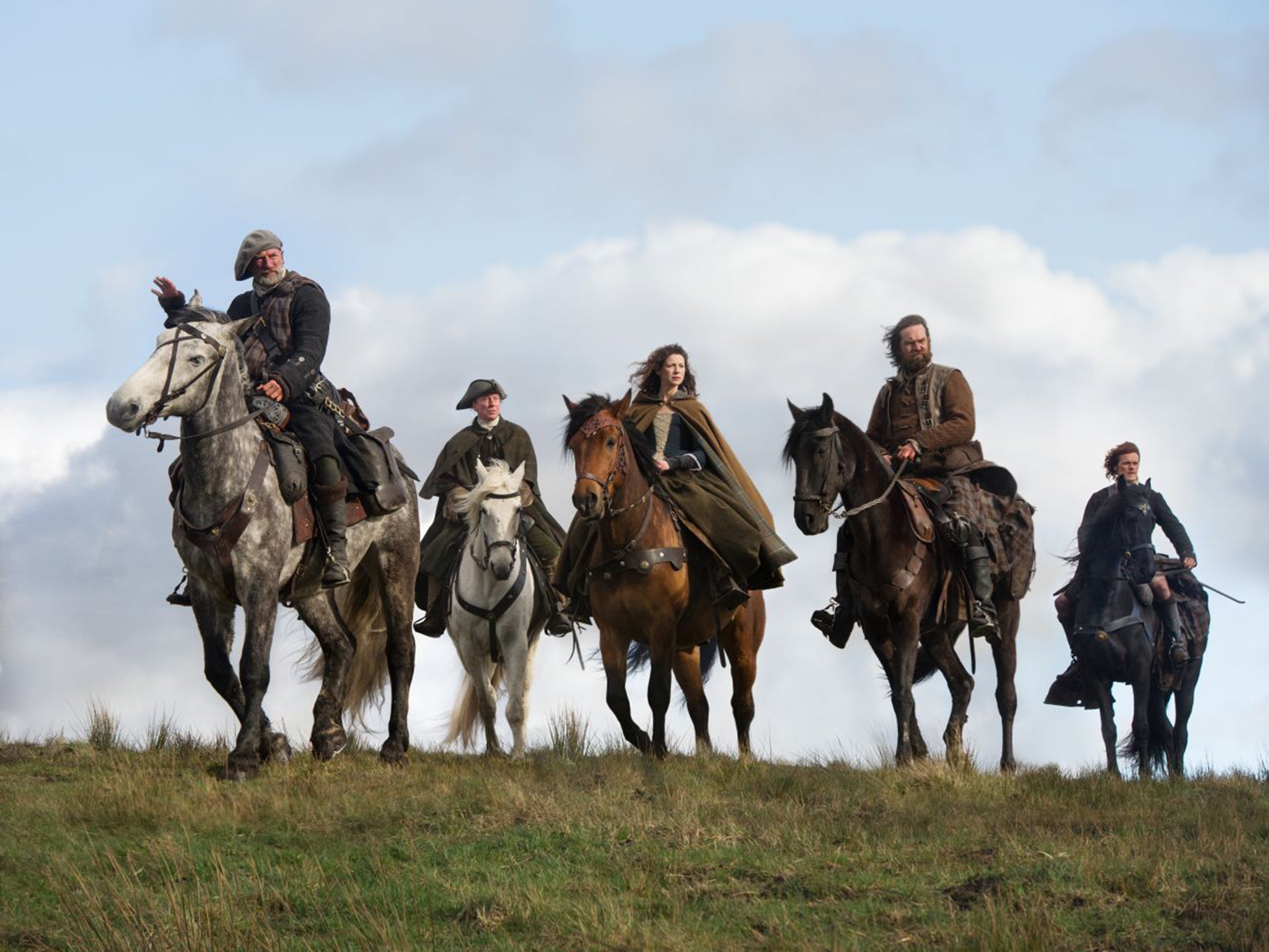 Prime movers: Caitriona Balfe (centre) and the cast of Outlander