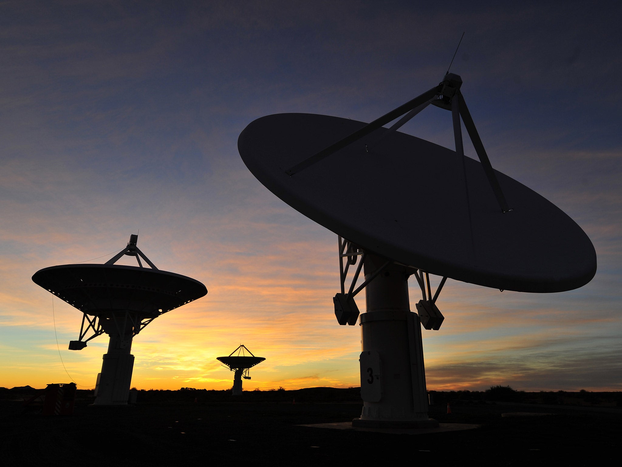 Night falls over radio telescope dishes at the proposed South African site for the Square Kilometre Array telescope