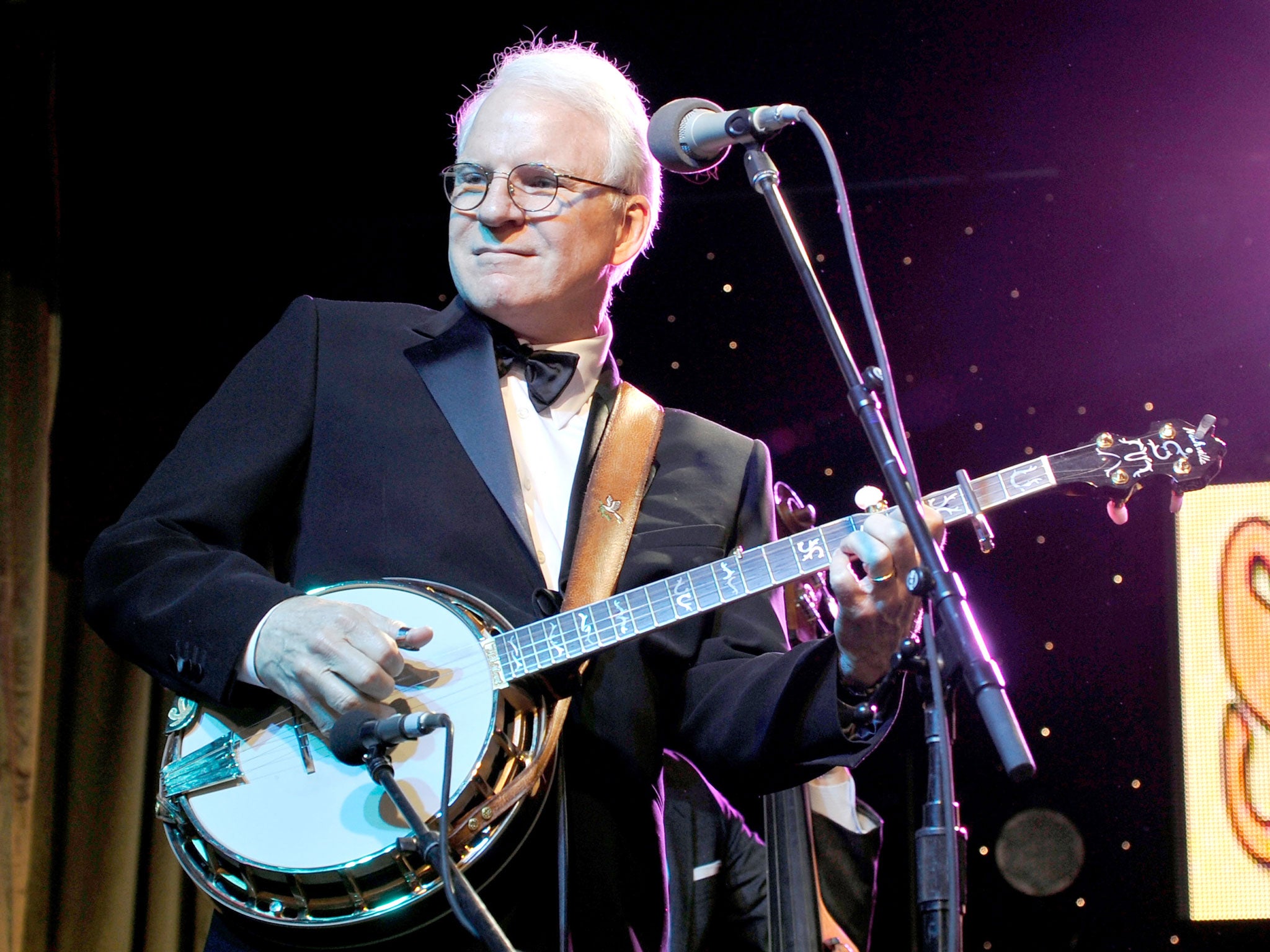 Banjo-playing Martin performing his 2013 album ‘Love Has Come For You’ (Getty)