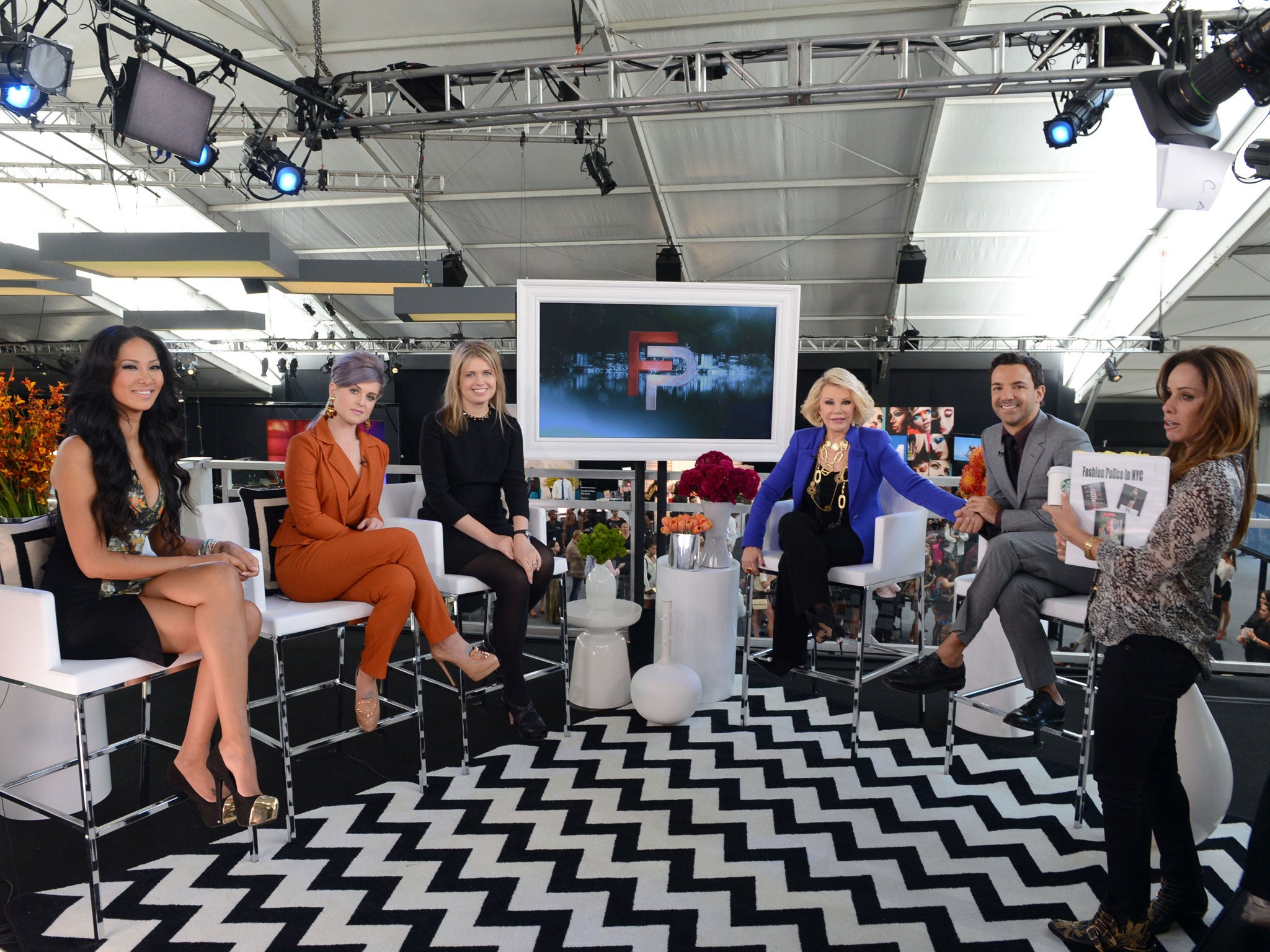 Designer Kimora Lee Simmons, host Kelly Osbourne, designer Jenny Packham, hosts Joan Rivers and George Kotsiopoulos and producer Melissa Rivers are seen on the set of Fashion Police in September 2012