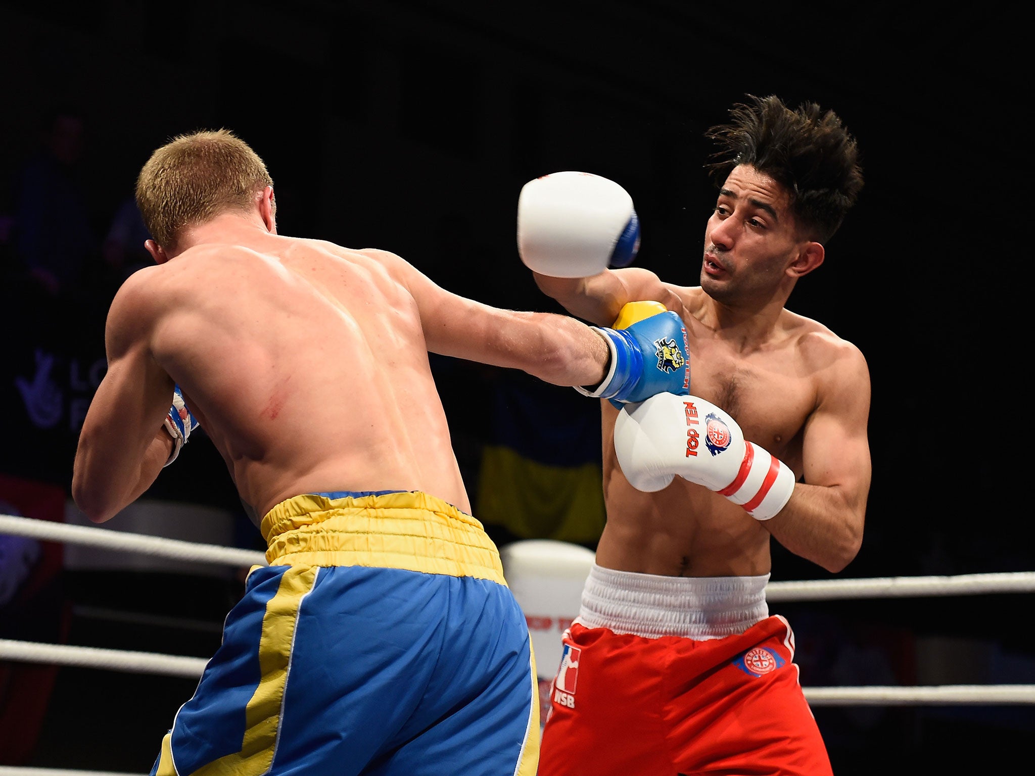 Qais Ashfaq (right) lost to Mykola Butsenko