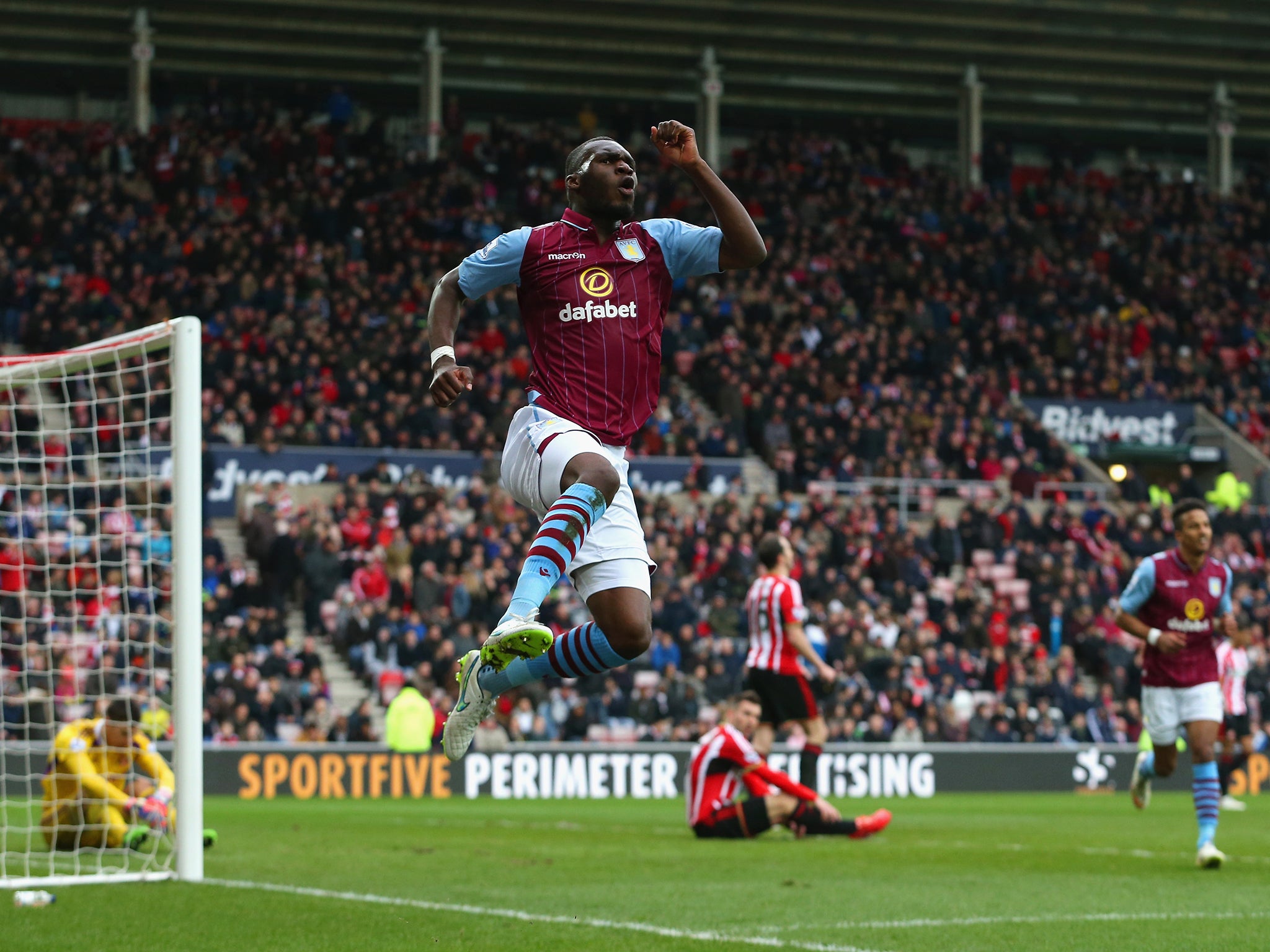 Christian Benteke of Aston Villa celebrates scoring Villa's fourth goal