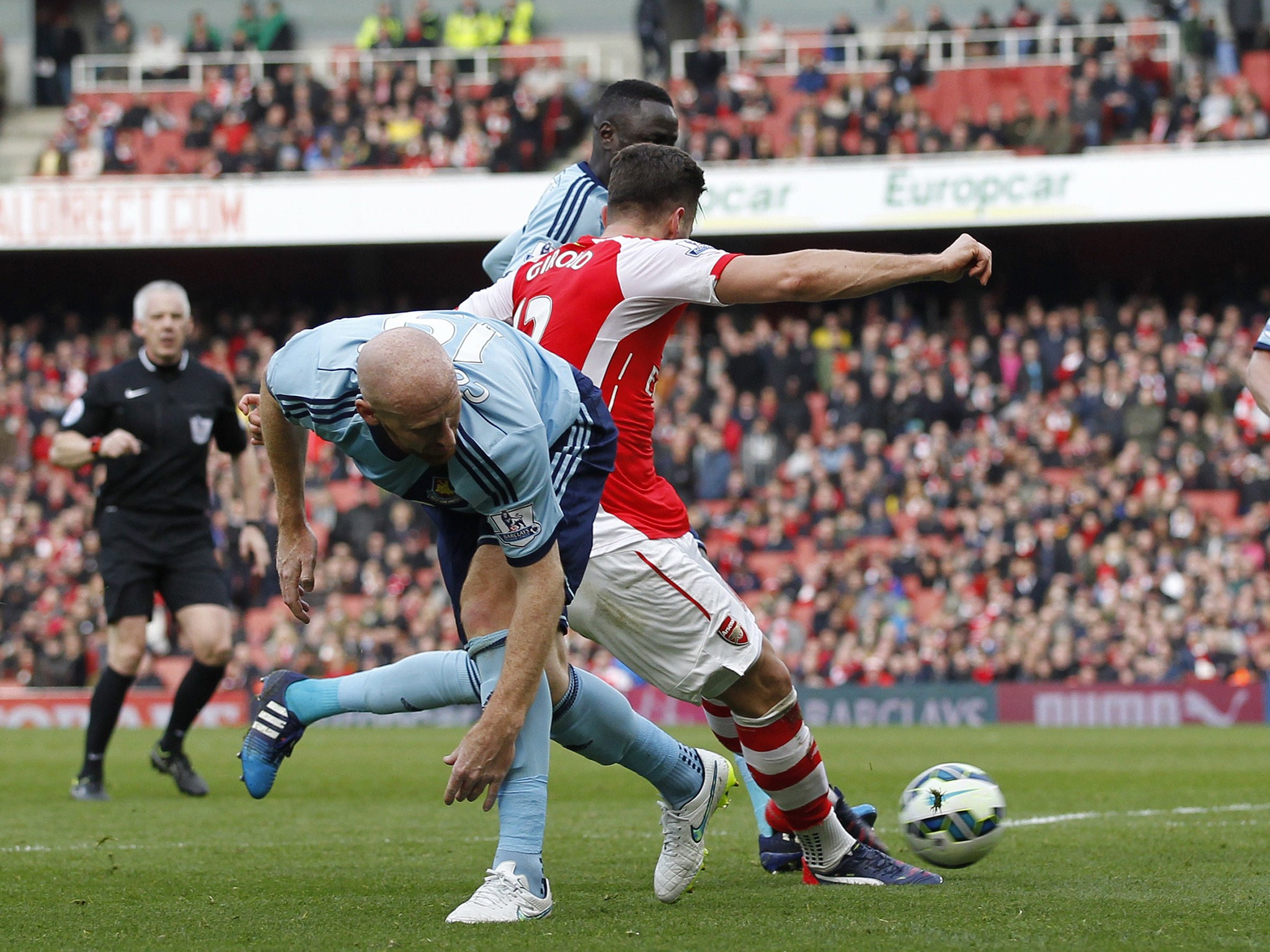 Giroud fires in the opening goal on the stroke of half-time