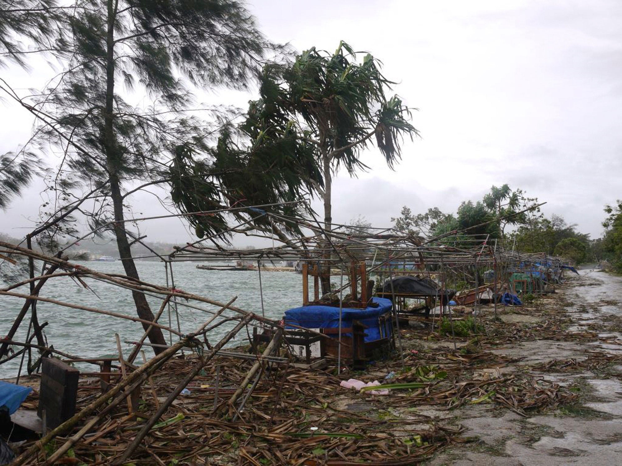 Debris is scattered along the coast in Port Vila