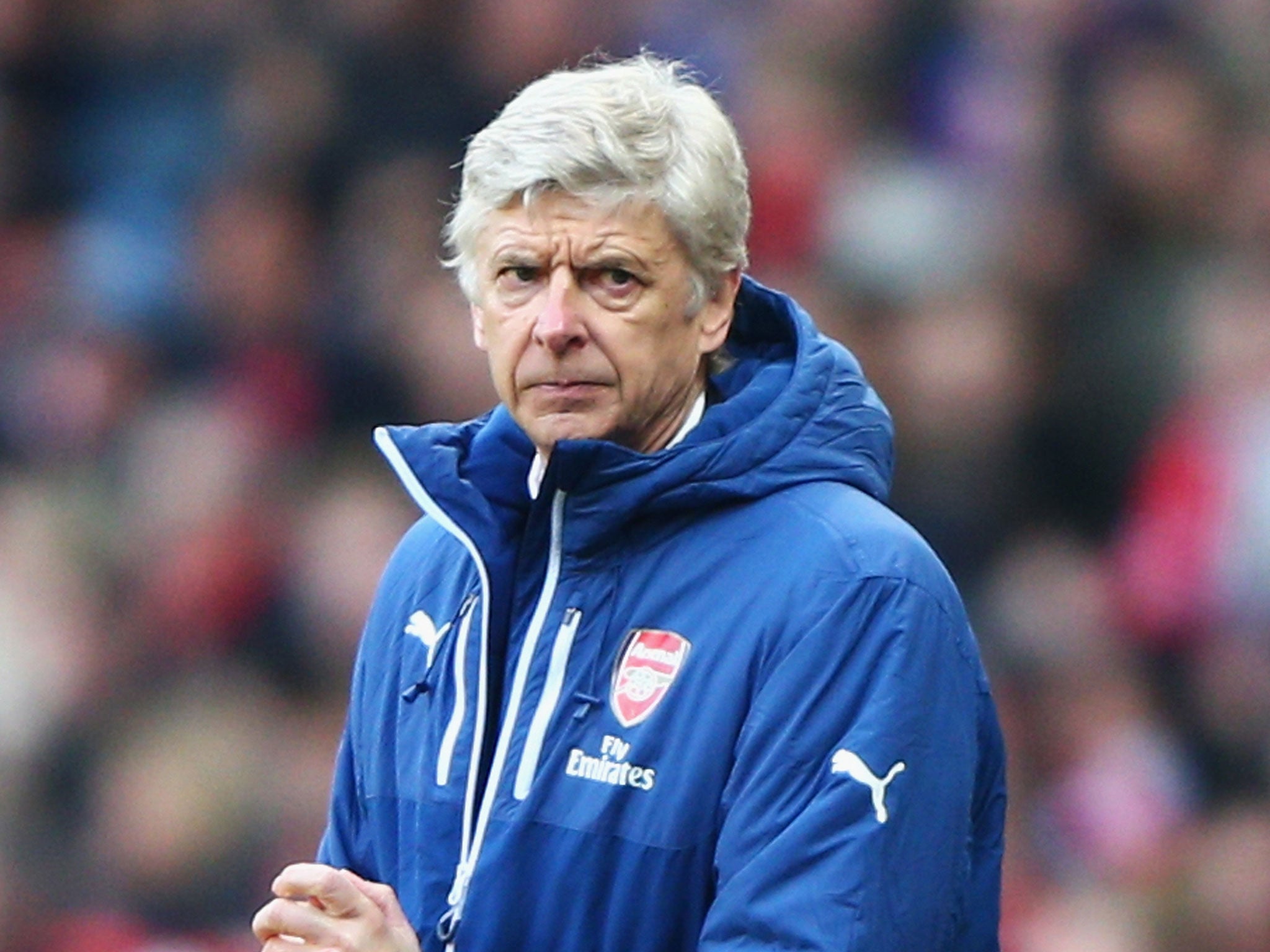 Arsenal manager Arsene Wenger looks on from the touchline